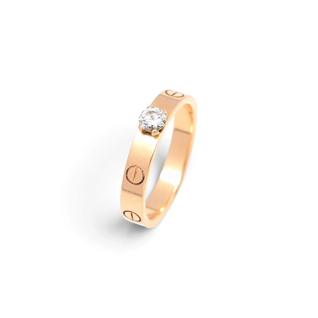 CARTIER. 'Love' ring in rose gold.