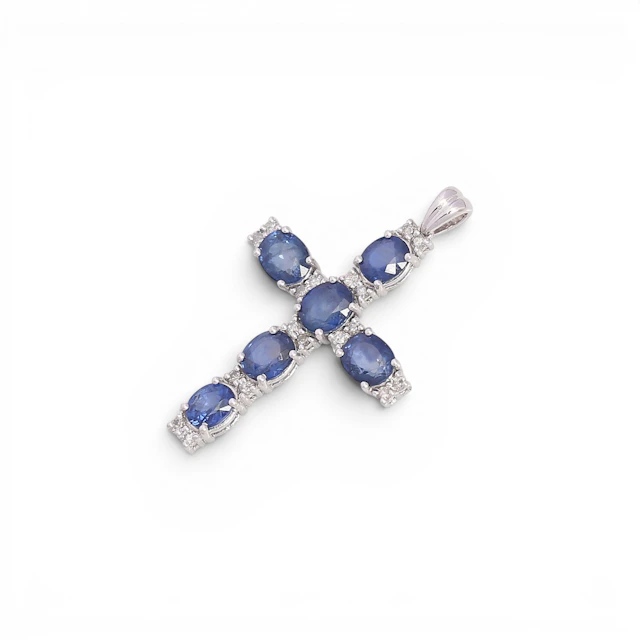Sapphires and diamonds pendant cross.