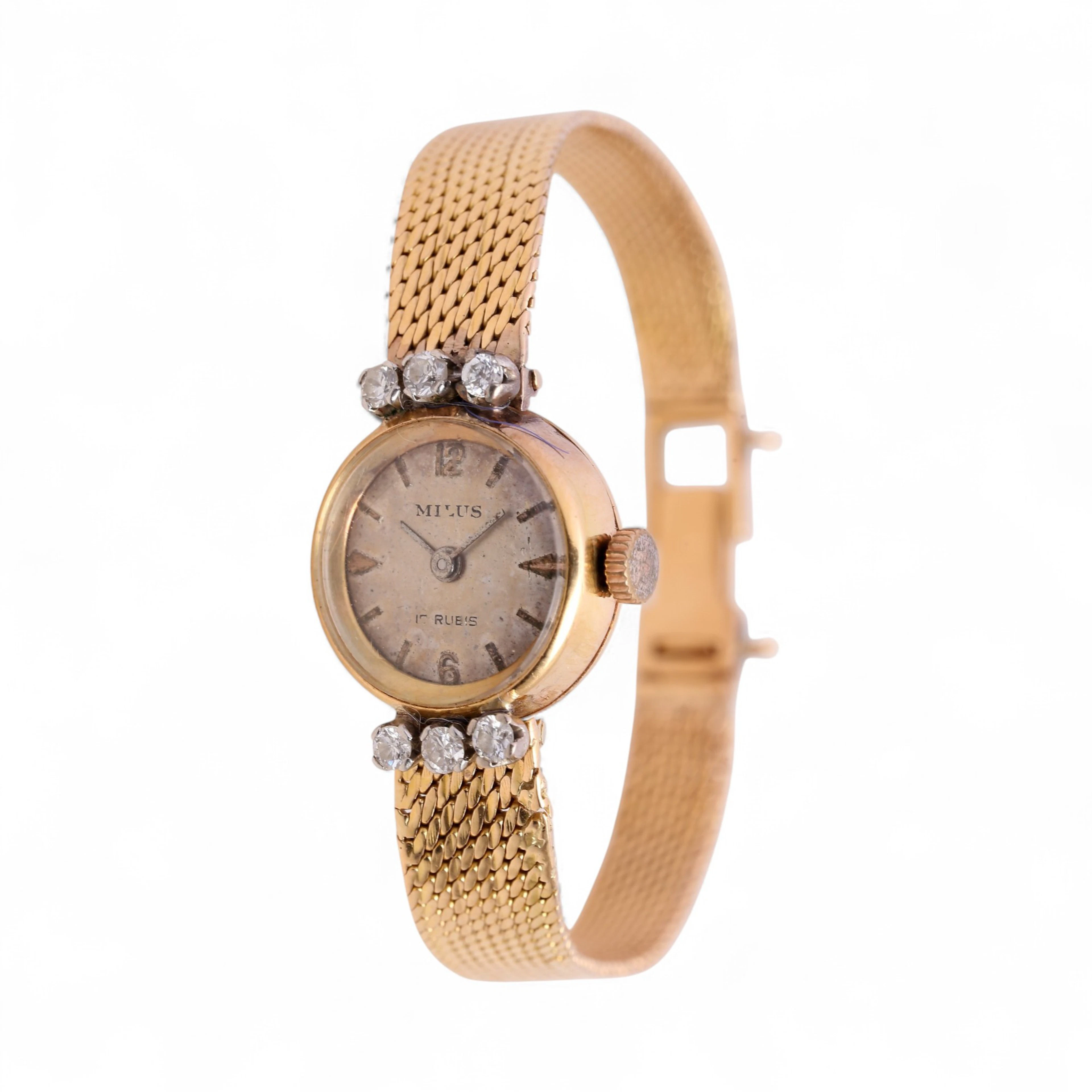 Milus women's jewel-watch in gold, mid 20th Century.