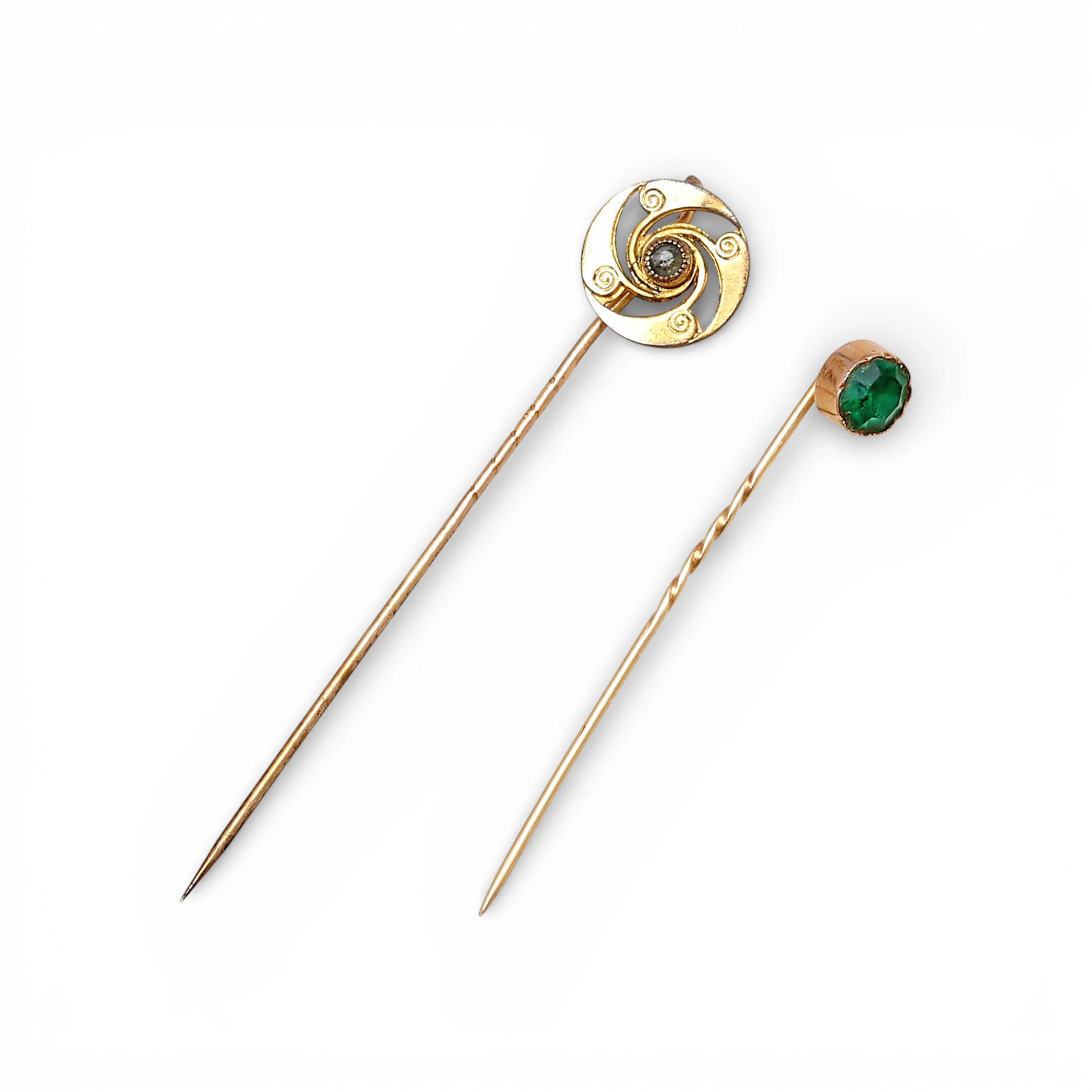 Two tie pins, mid 20th Century.
