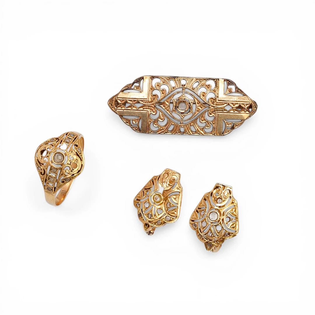Brooch, ring and earrings set in gold, early 20th Century.