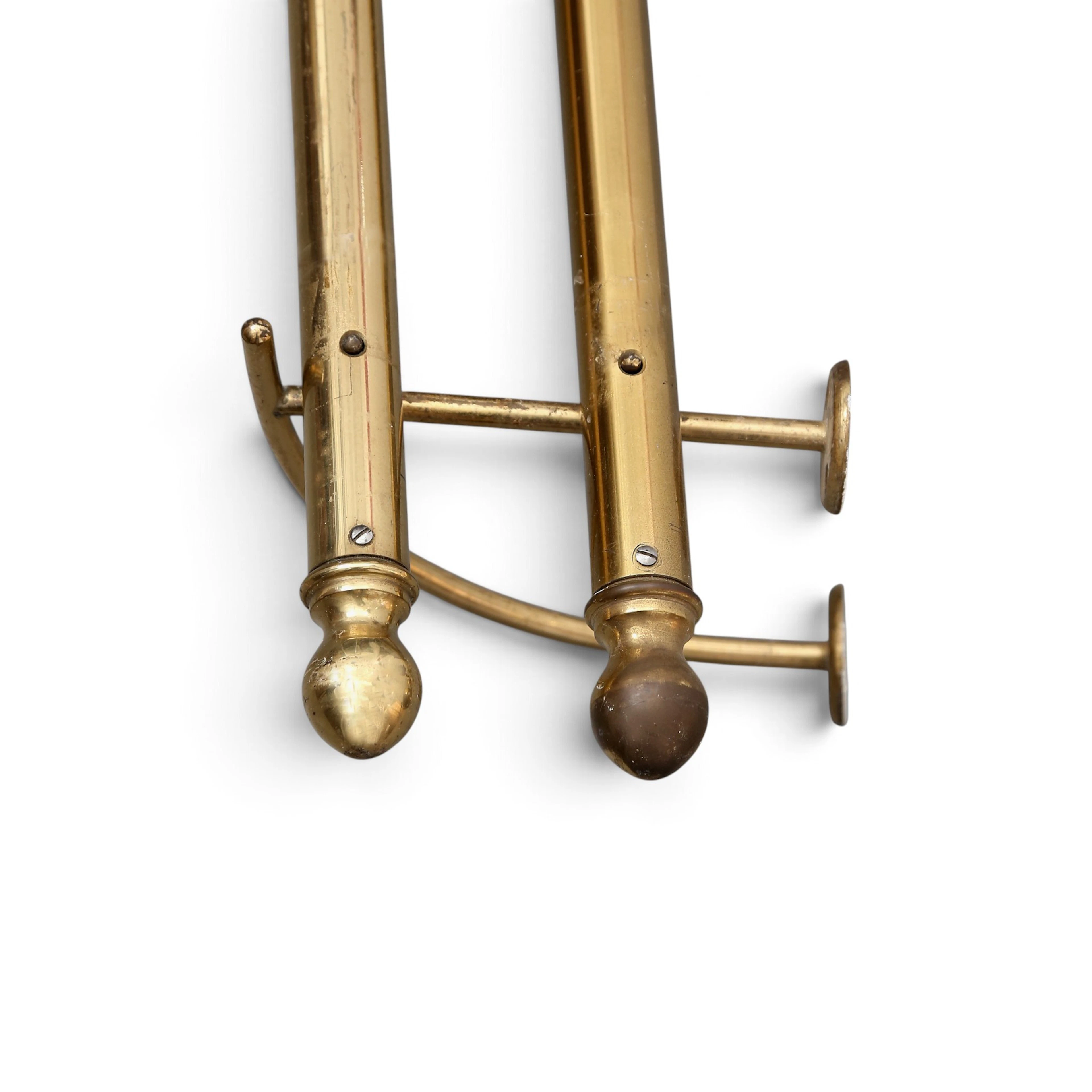 Set of two brass curtain rods, 20th Century.
