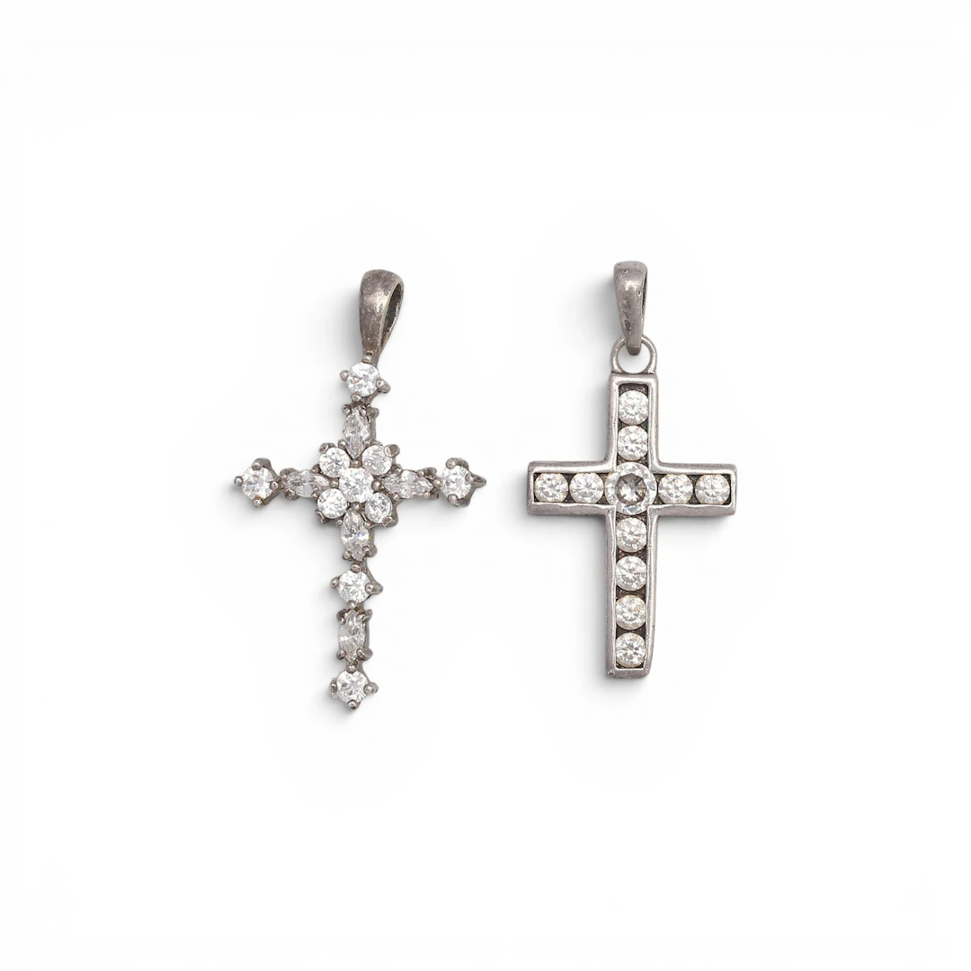 Two zircons pendant crosses.