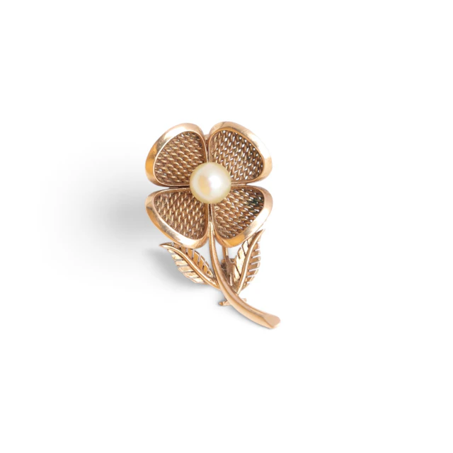 Floral brooch in gold and pearl, mid 20th Century.