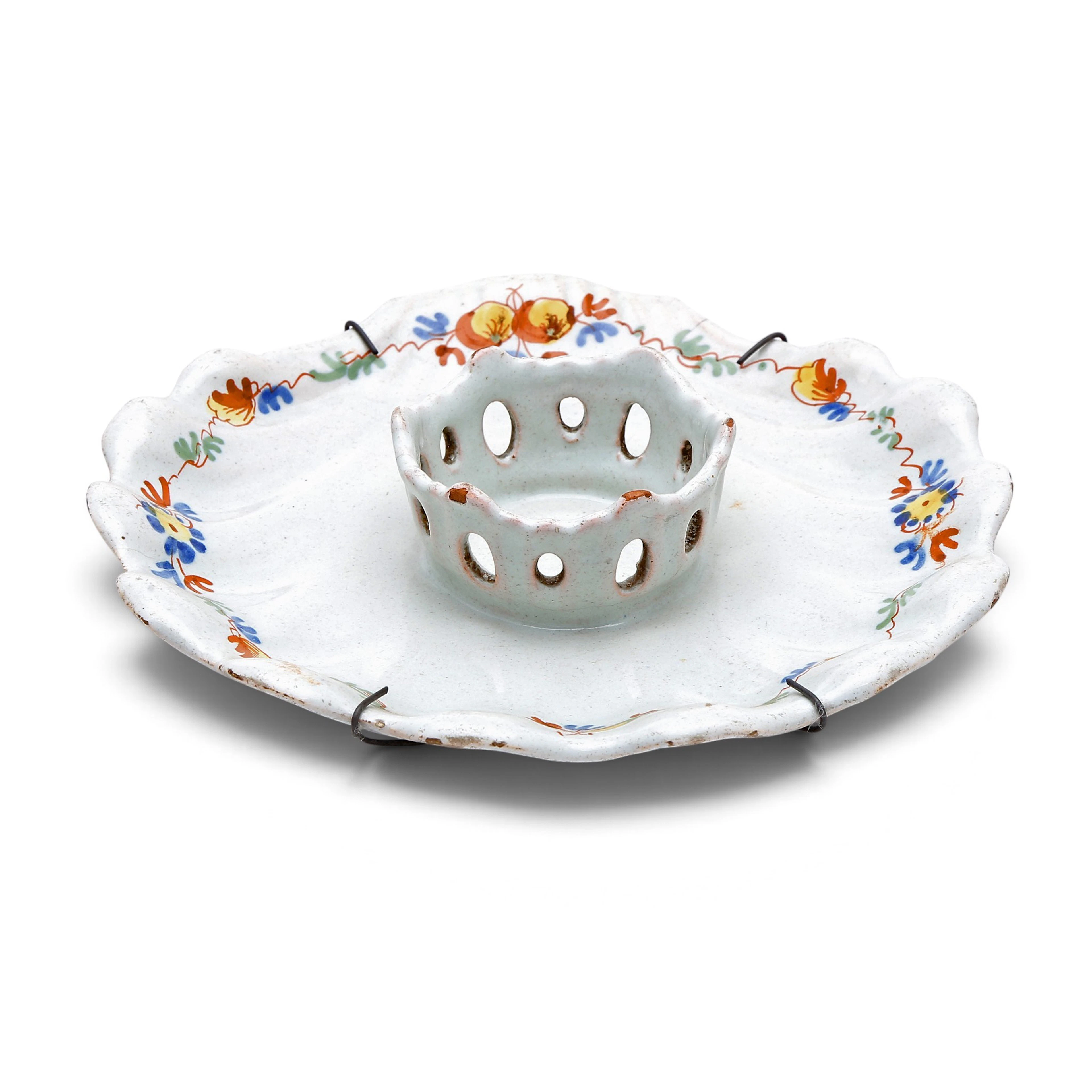 Alcora earthenware mancerina from the “El Ramito” series, 18th century.