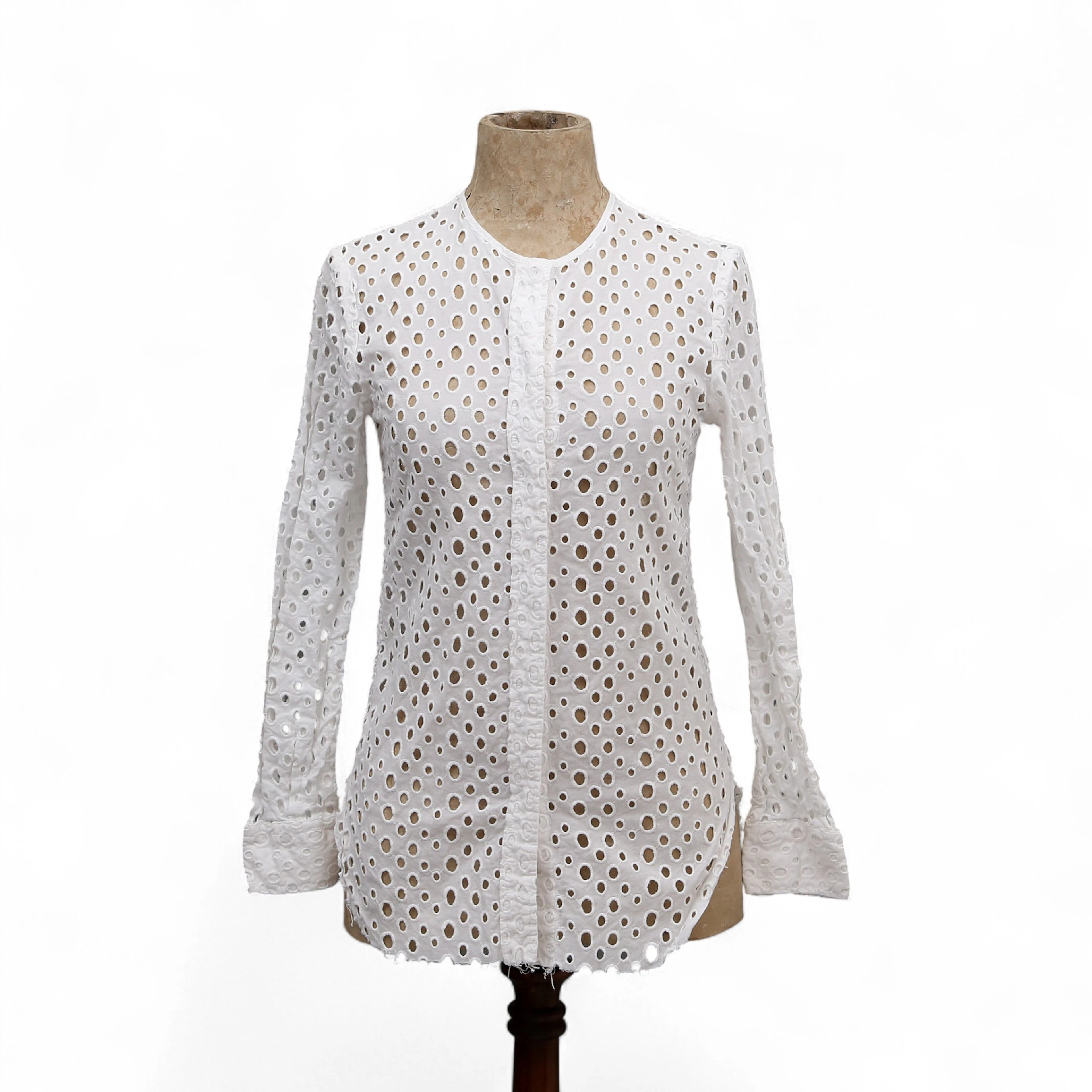 ISABEL MARANT. White cotton blouse with embroidered holes.