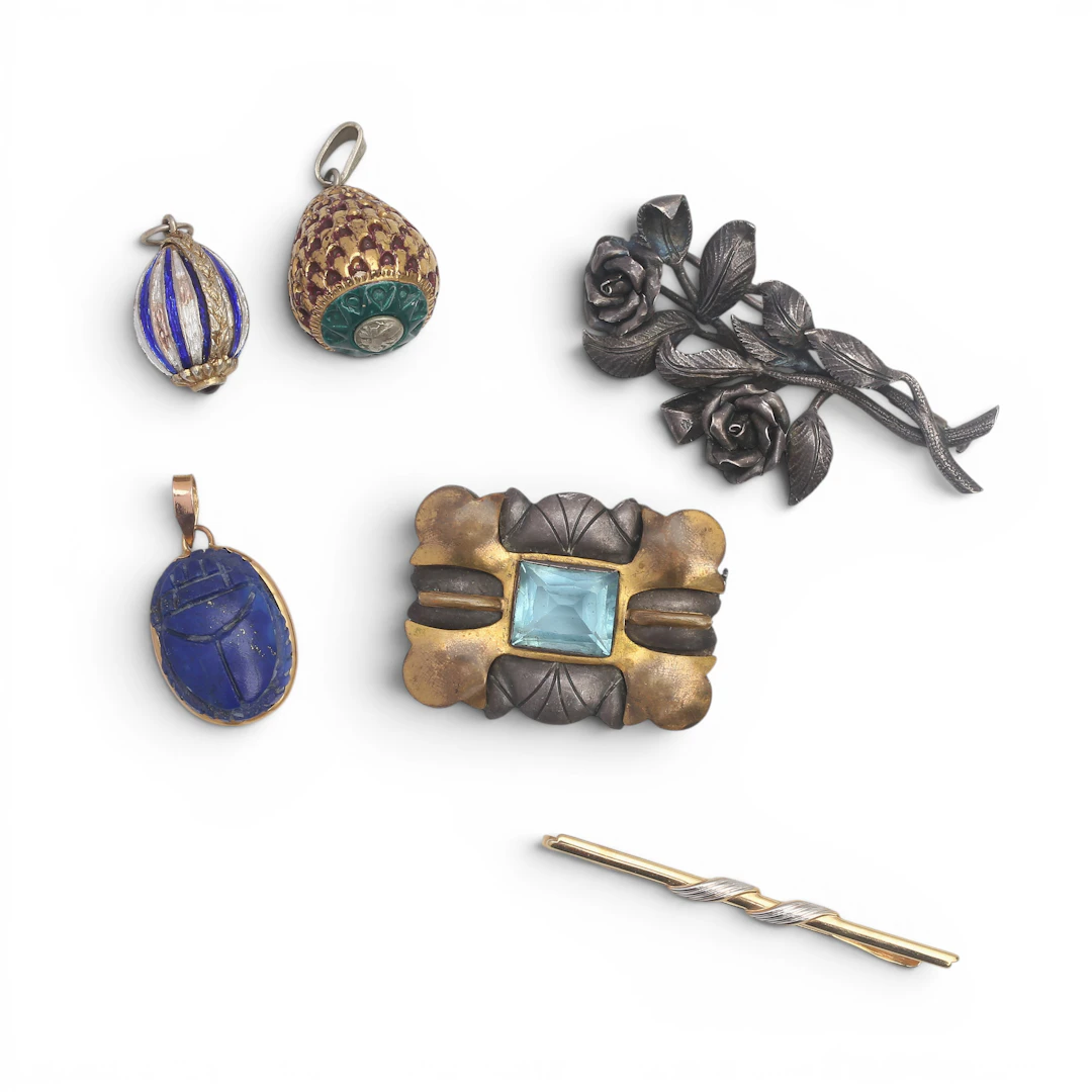 Three brooches and three pendants, mid 20th Century.