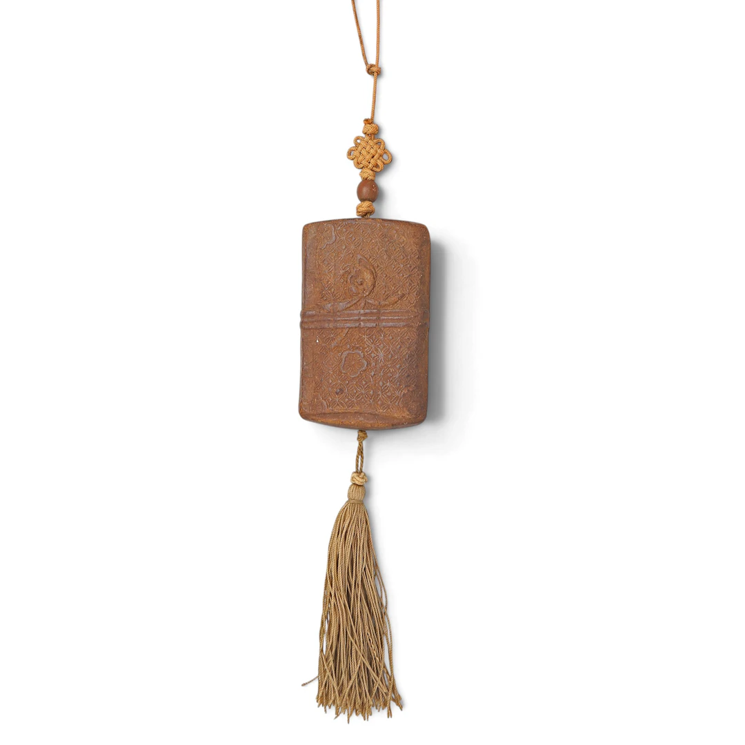 Japanese inro-simile pendant in moulded papier mâché, 20th Century.
