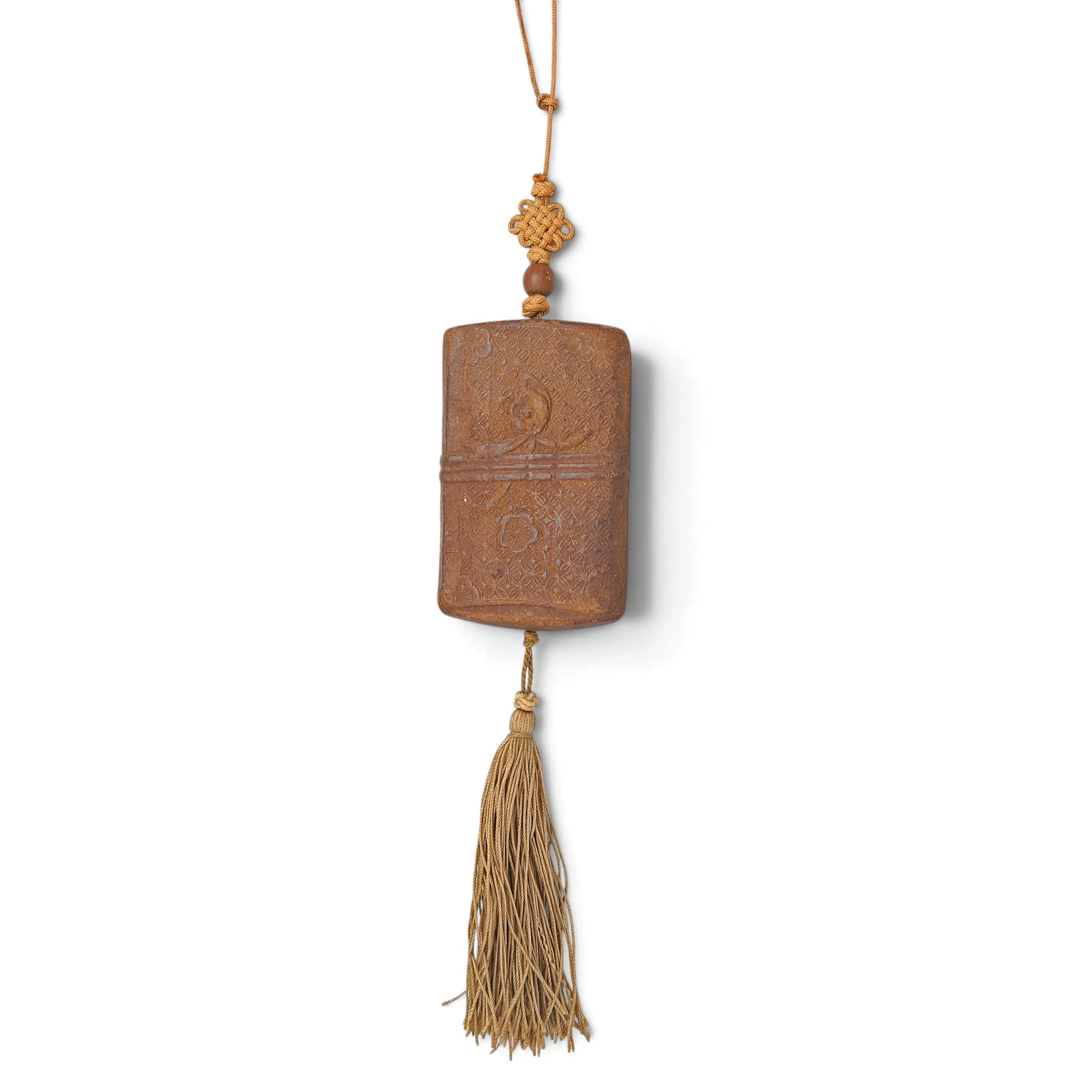 Japanese inro-simile pendant in moulded papier mâché, 20th Century.