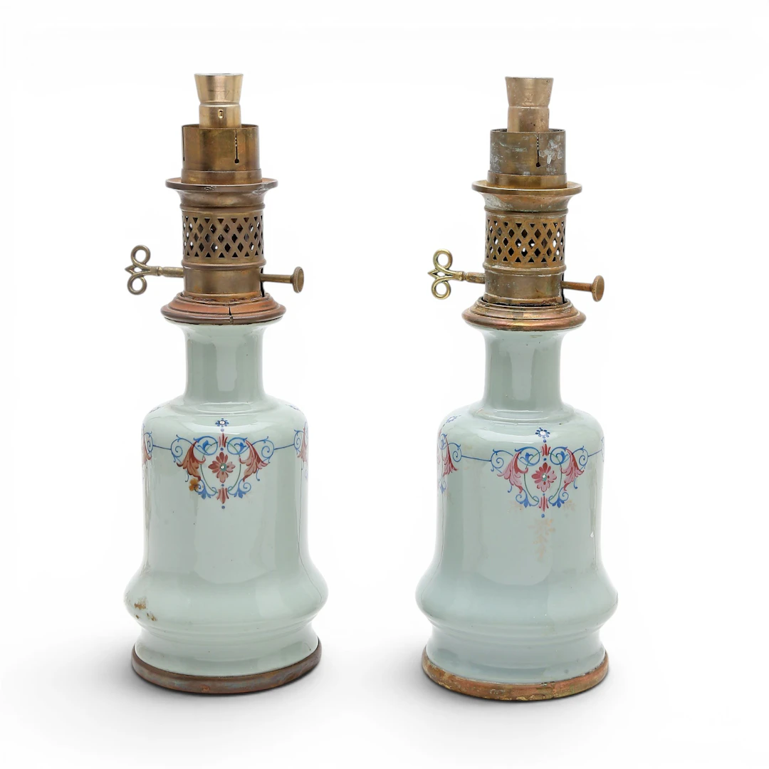Pair of French table lamps in earthenware and brass, late 19th Century.