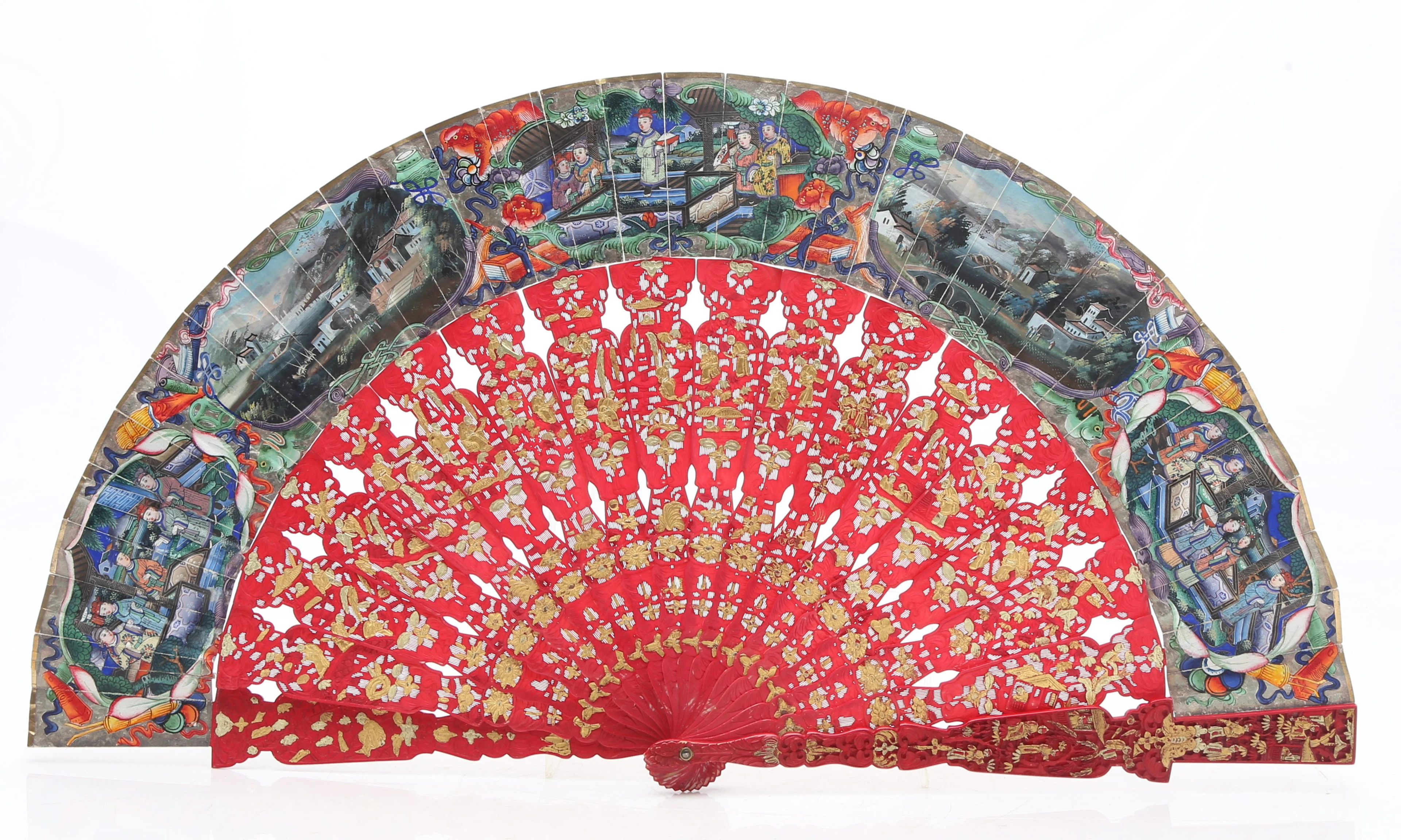 Chinese "thousand faces" fan with faux cinnabar lacquer sticks and