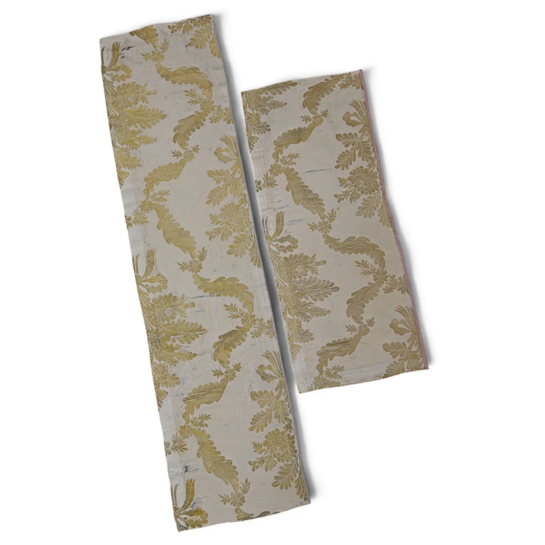Two fragments in gold-brocaded silk, 18th Century.