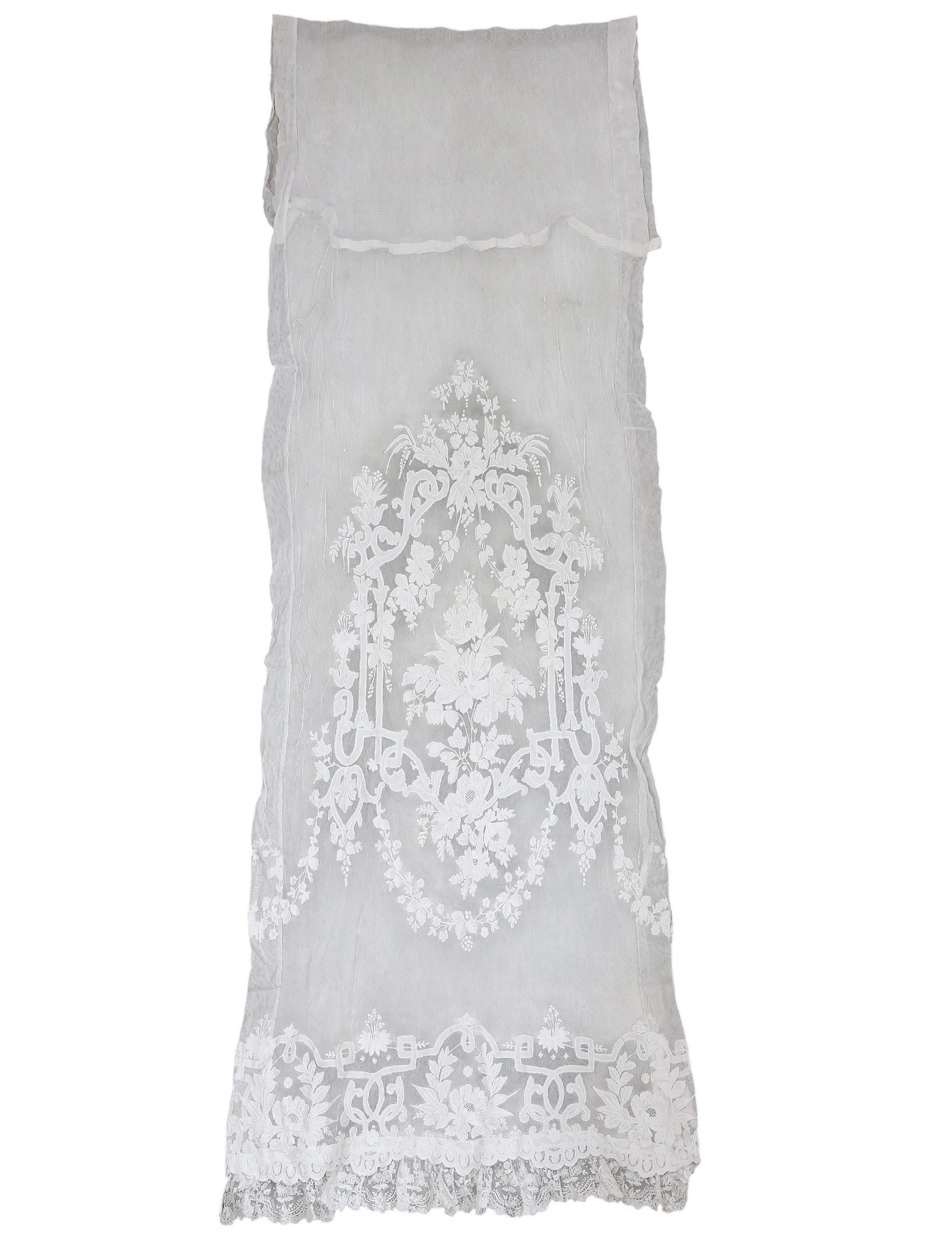Modernist tulle curtain with embroidered applications and lace border