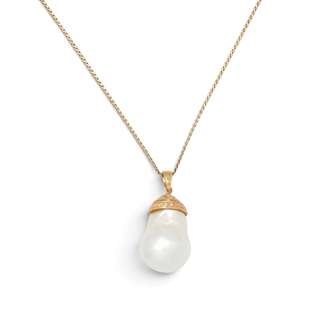 Pendant with a Baroque pearl and diamonds.