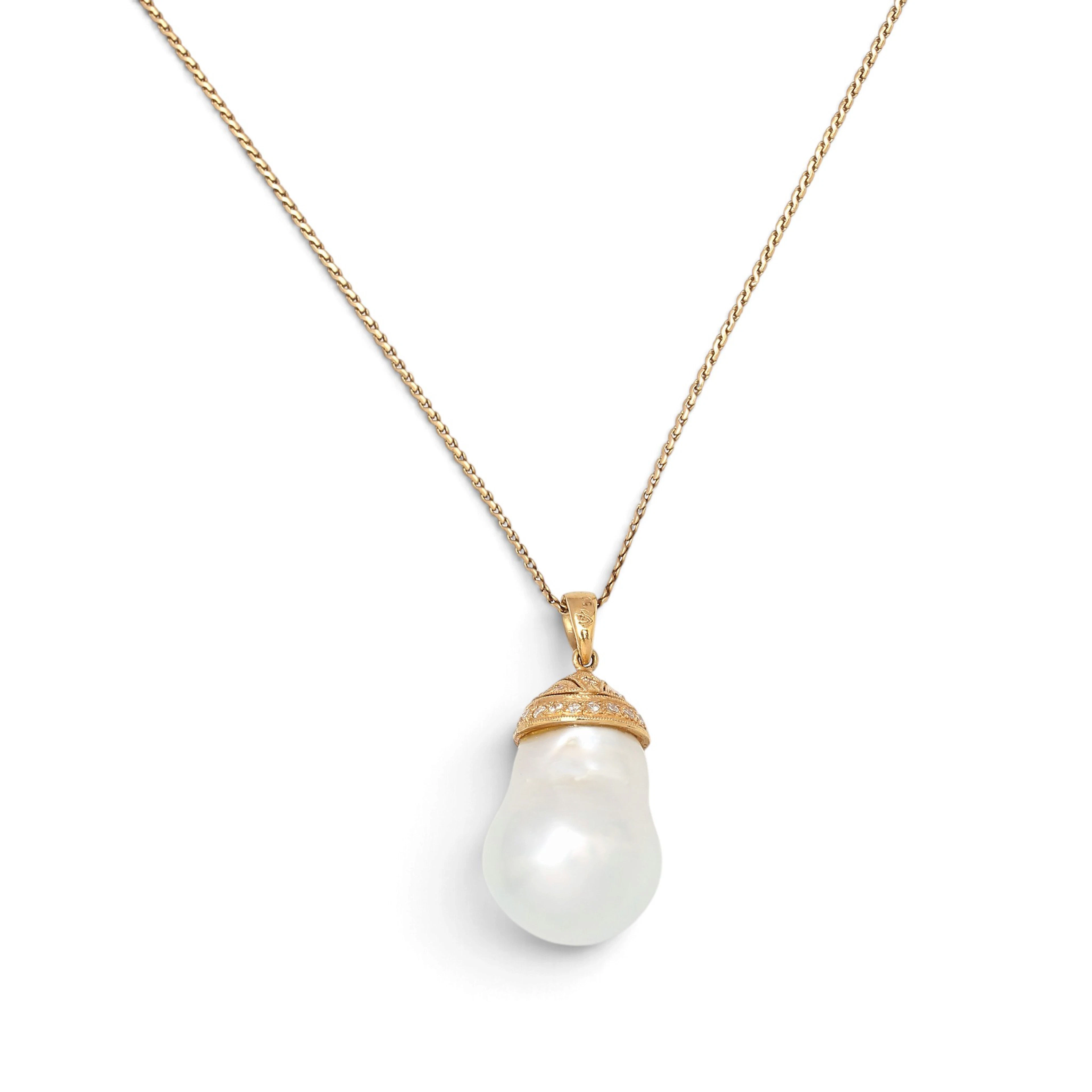 Pendant with a Baroque pearl and diamonds.