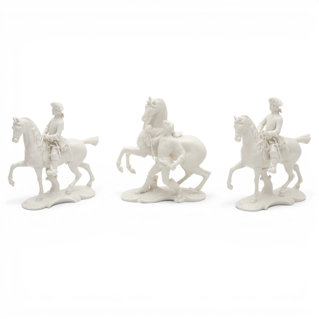 "Horsemen", three glazed porcelain figures from Nymphenburg, 20th Century.