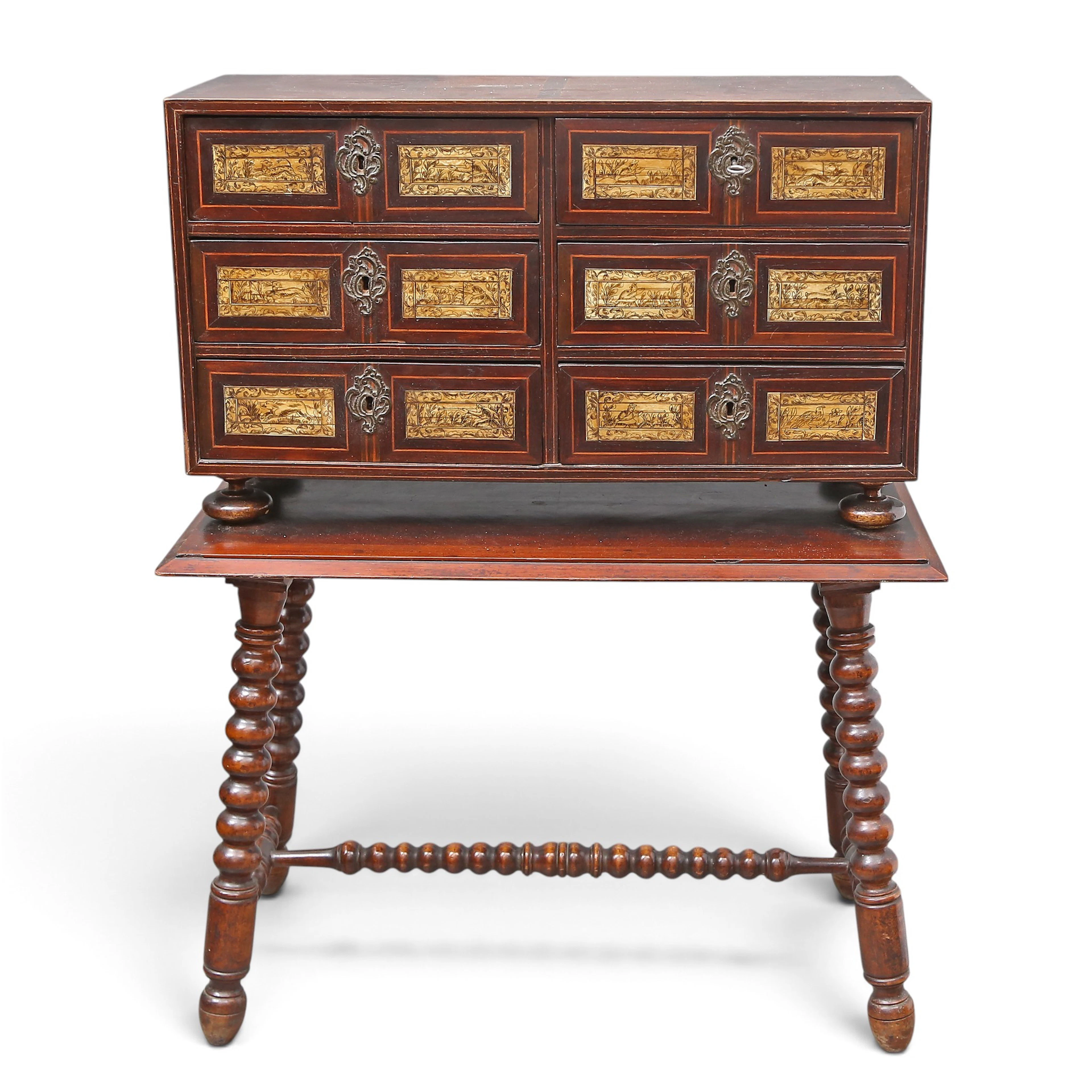 BAROQUE-STYLE walnut casket with satinwood stringing and bone-engraved