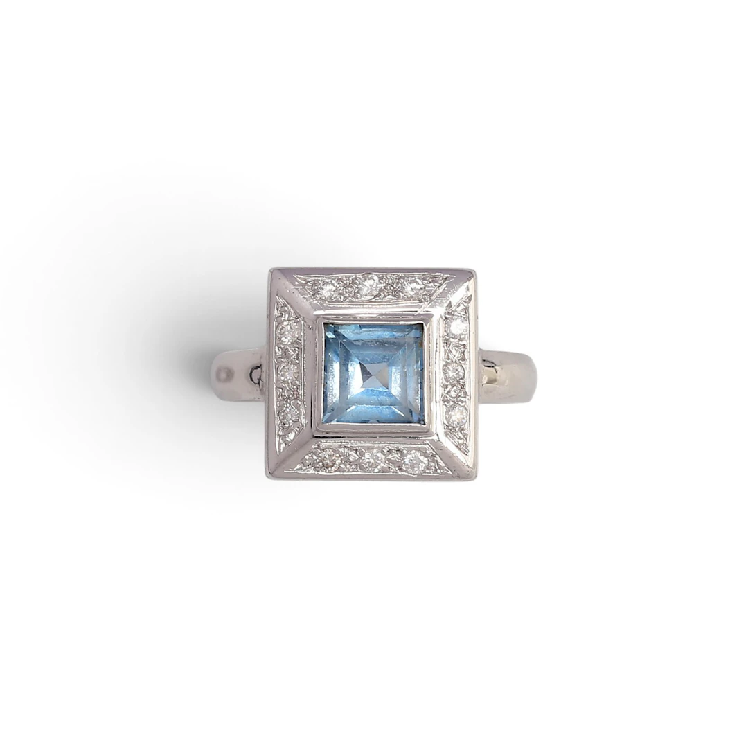 Synthetic spinel and diamonds ring.
