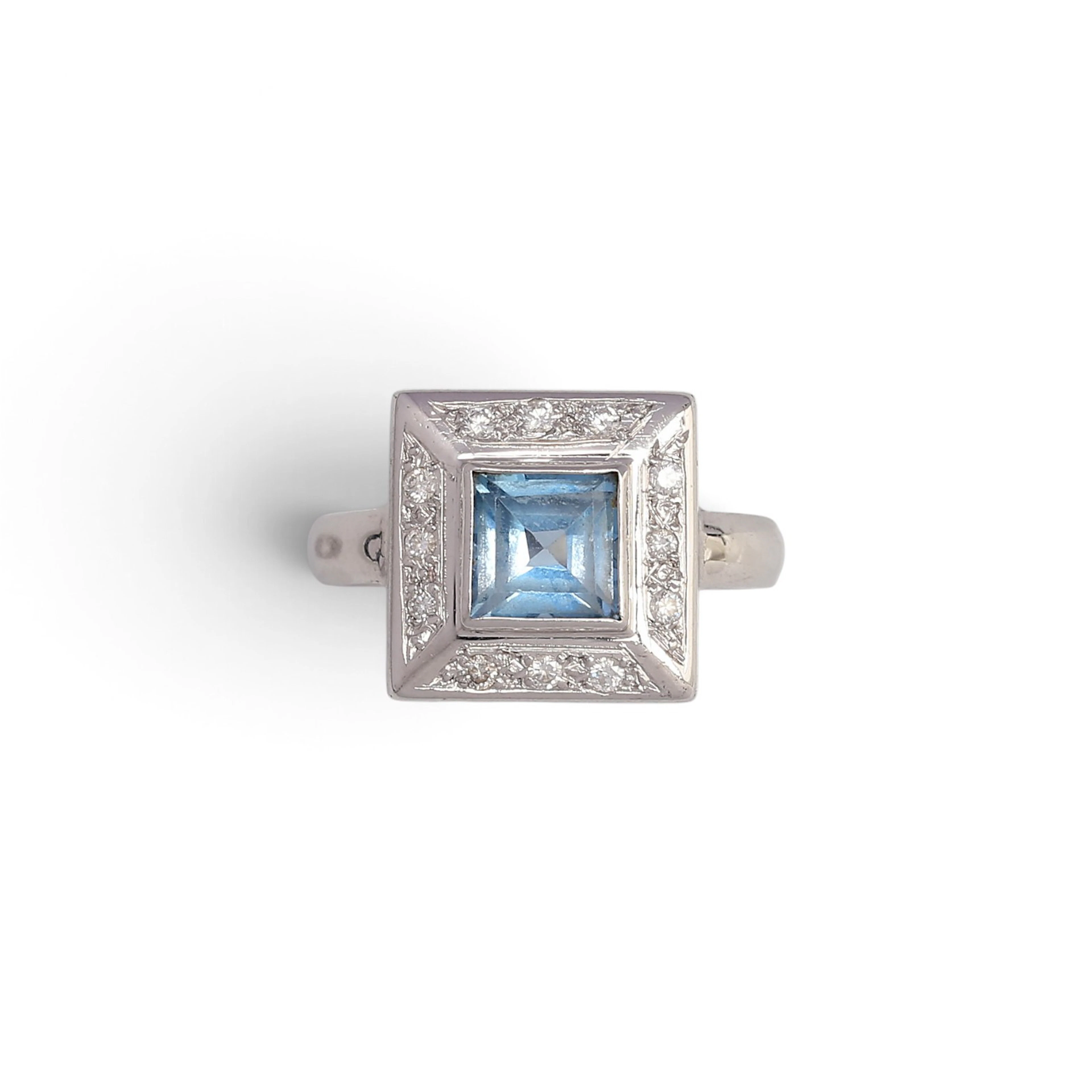 Synthetic spinel and diamonds ring.