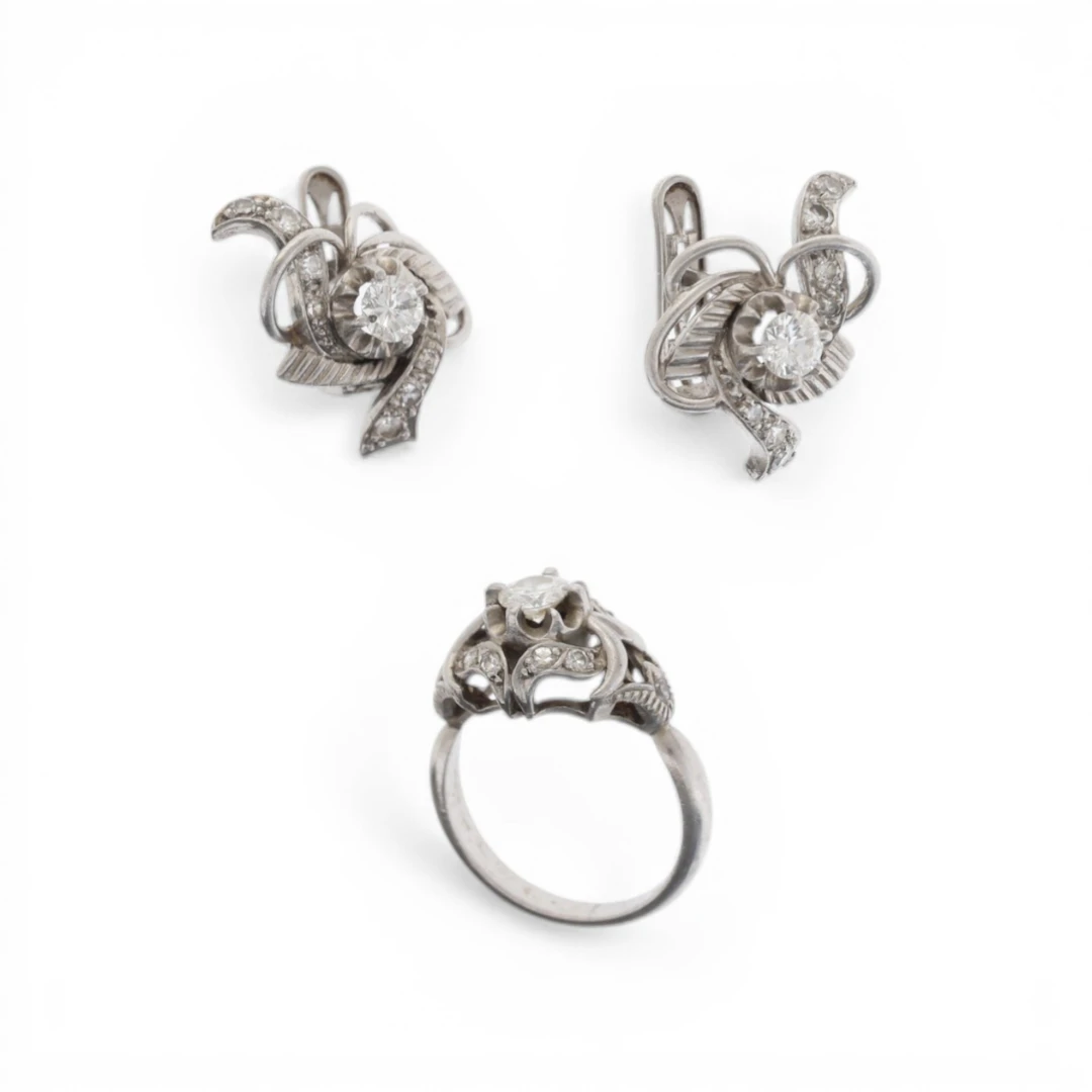 Diamonds ring and earrings set, mid 20th Century.