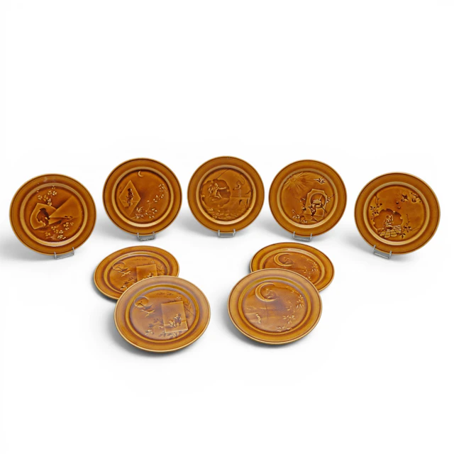 HIPPOLYTE BOULANGER & CIE. Set of nine dishes with Japanese patterns