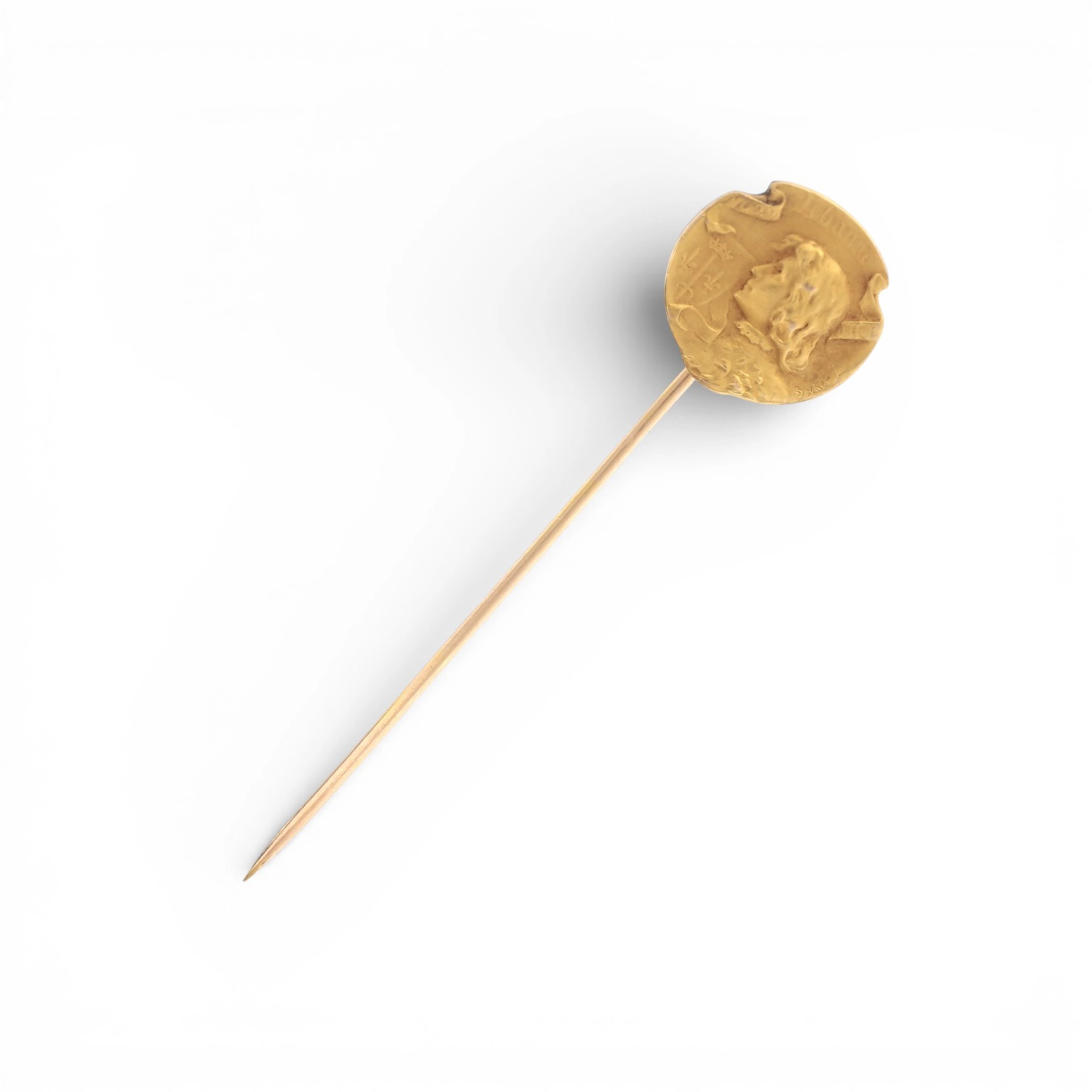 Art Nouveau tie pin depicting Joan of Arc, circa 1900.
