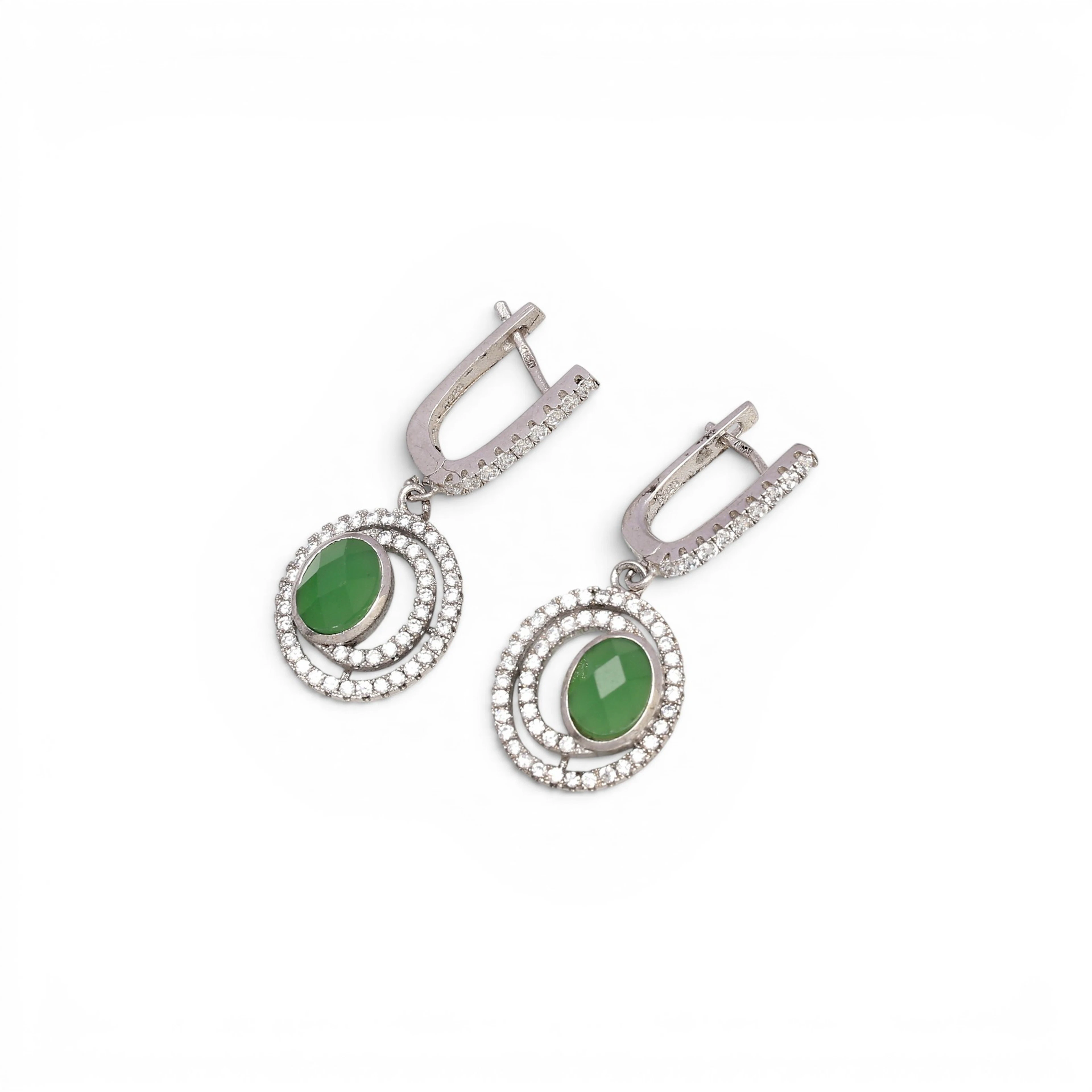 Zircons pendant earrings.