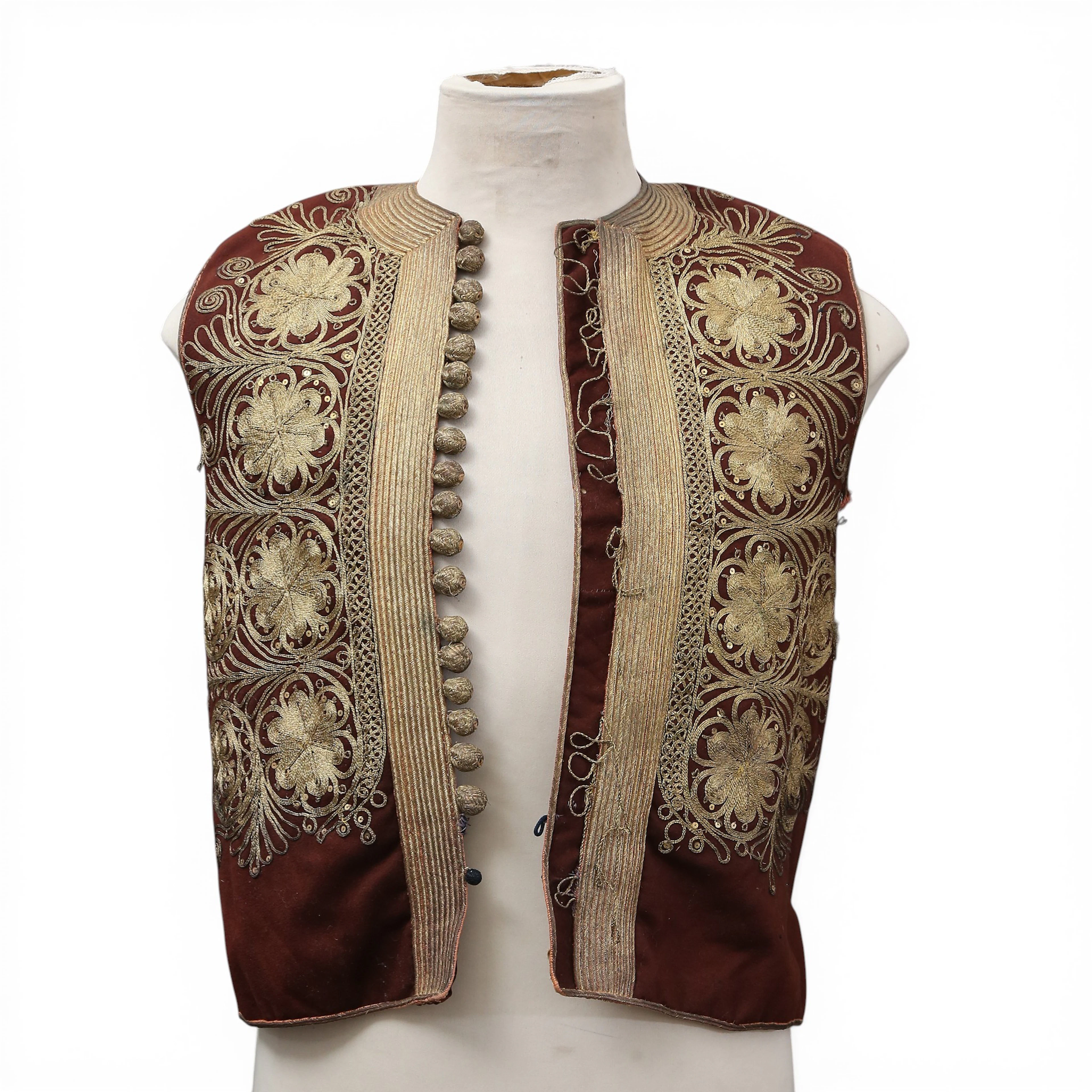 Egyptian vest and Indian dress in cotton with metallic applications