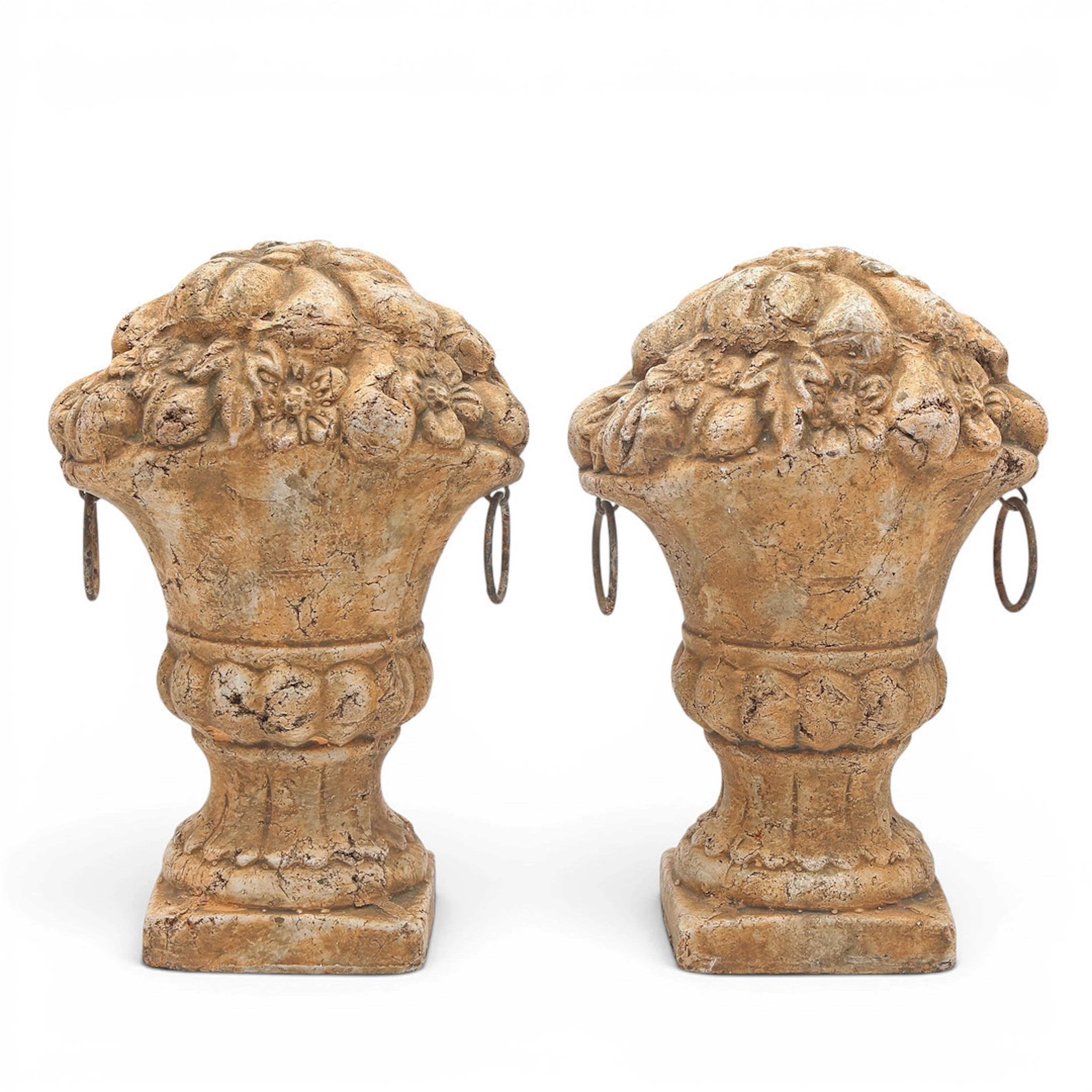 Pair of terracotta urns with fruit, 20th Century.