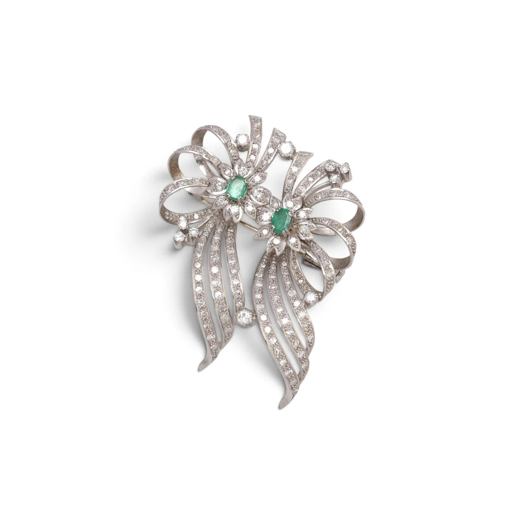 Diamonds and emeralds brooch, mid 20th Century.