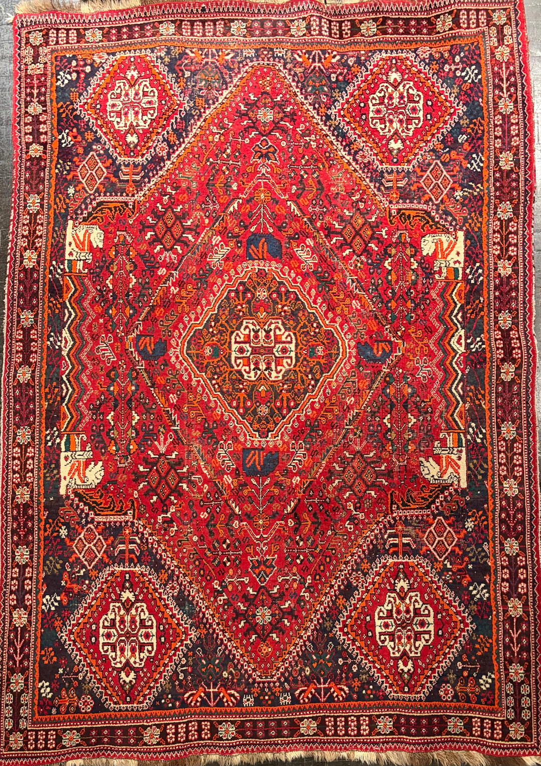 Persian wool rug with geometric motifs, 20th century.