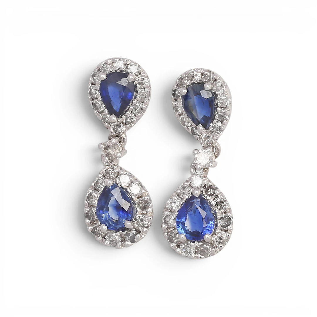 Sapphires and diamonds long earrings.