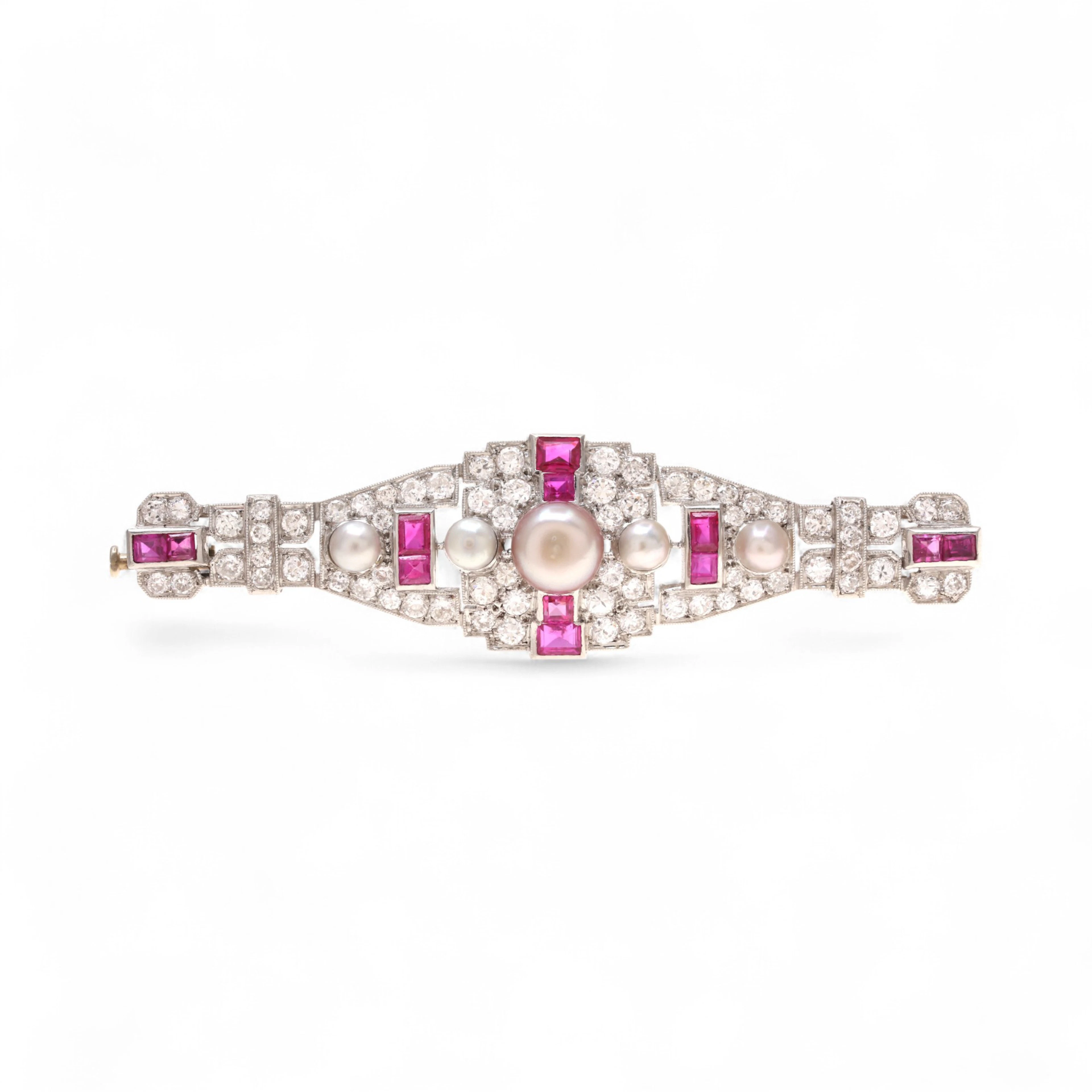 Art Deco brooch with diamonds, rubies and pearls, circa 1925.