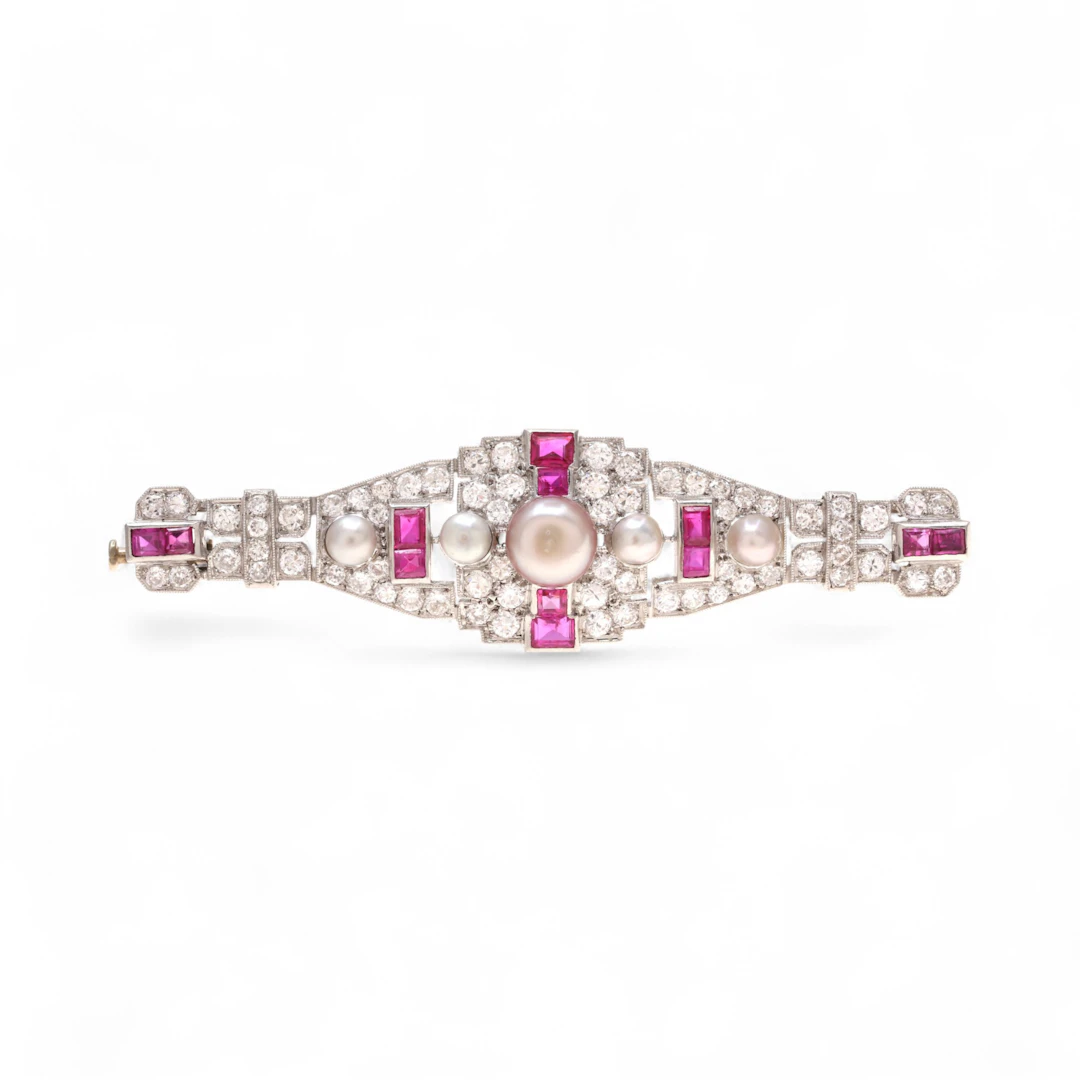 Art Deco brooch with diamonds, rubies and pearls, circa 1925.