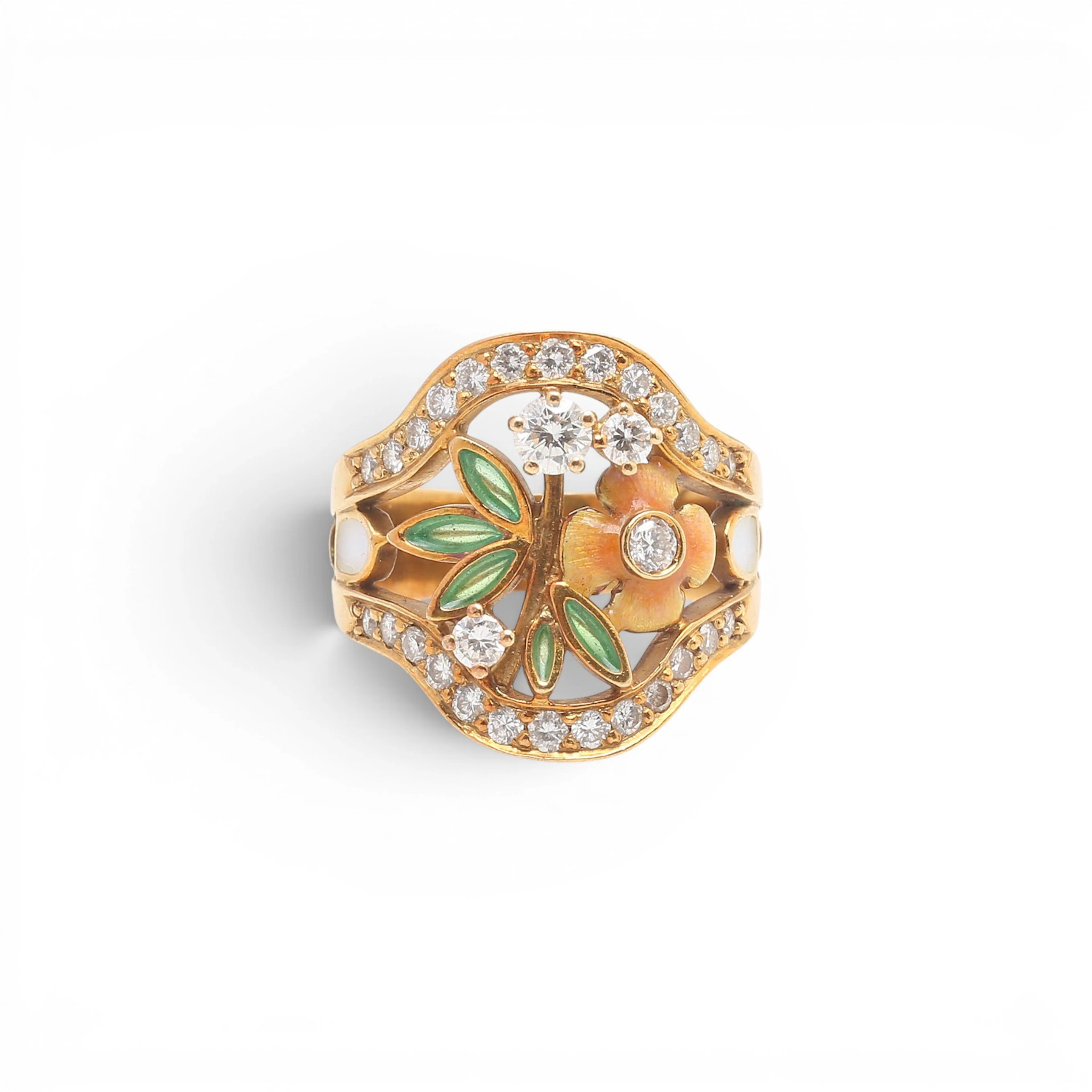 Gold and diamonds floral ring.