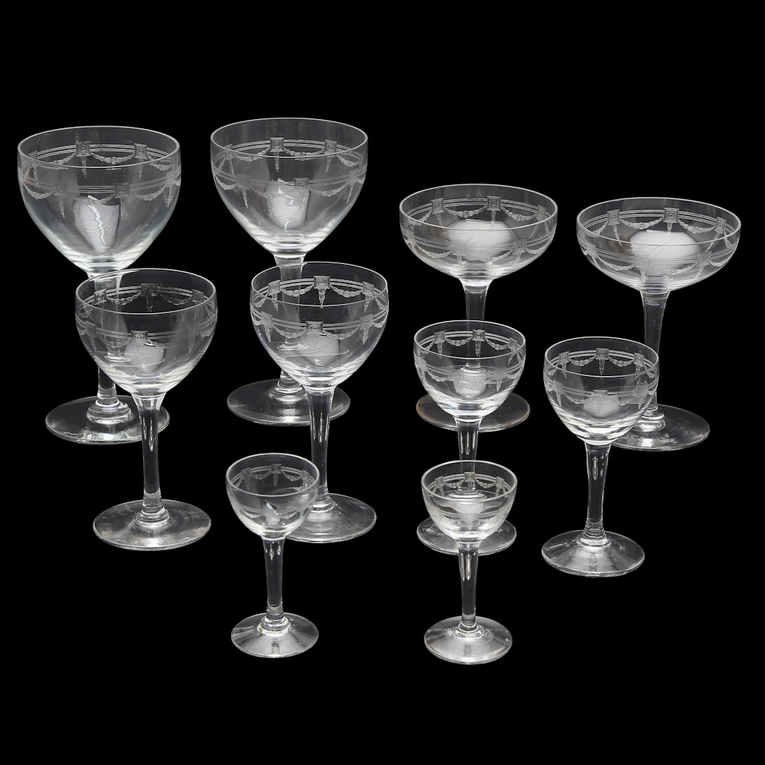 Sixteen-service glassware set in Baccarat "guilloché" crystal, late