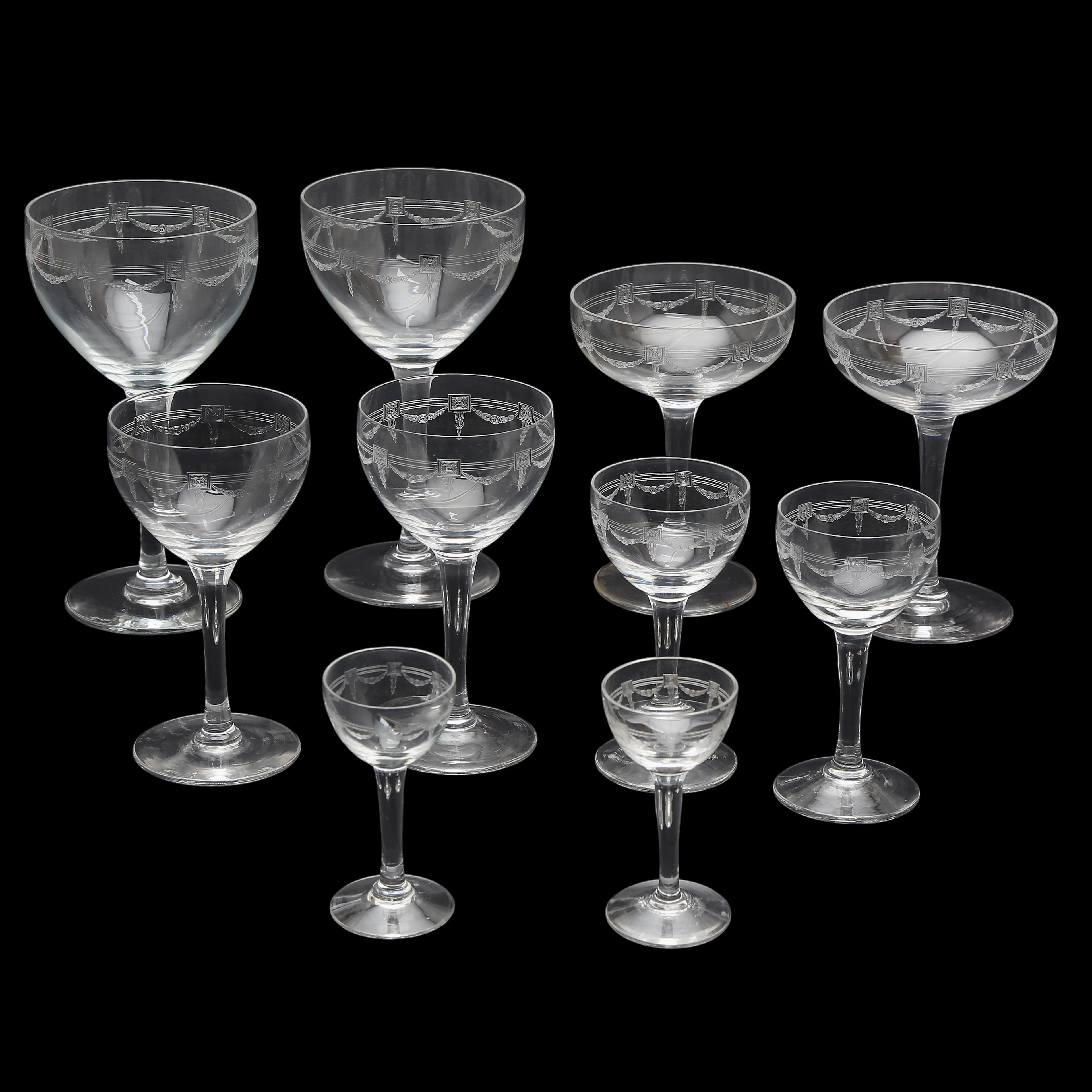 Sixteen-service glassware set in Baccarat "guilloché" crystal, late