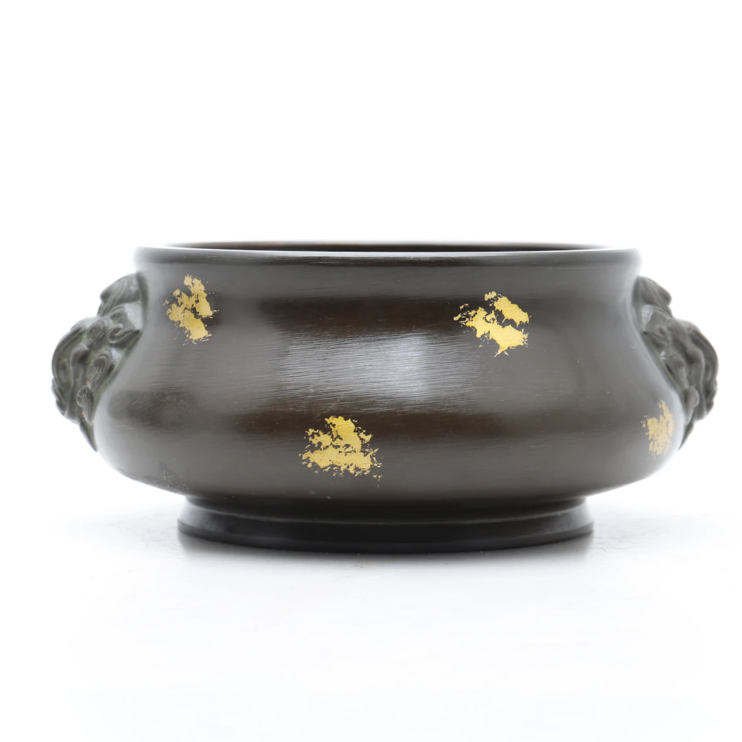 Chinese Qing censer in “gilt-splashed” bronze, 20th Century.