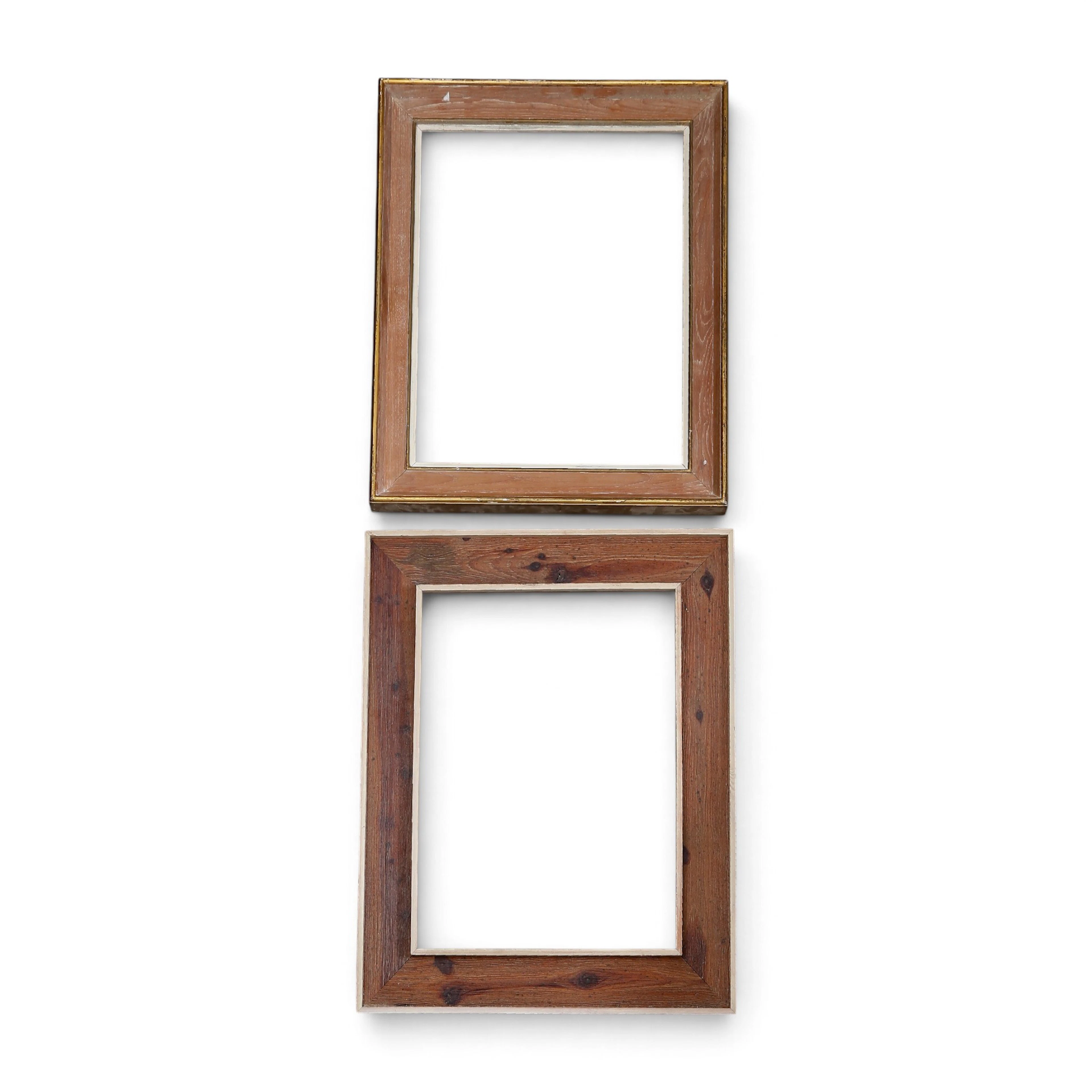 Two frames in patinated and partially gilt wood, late 20th Century.