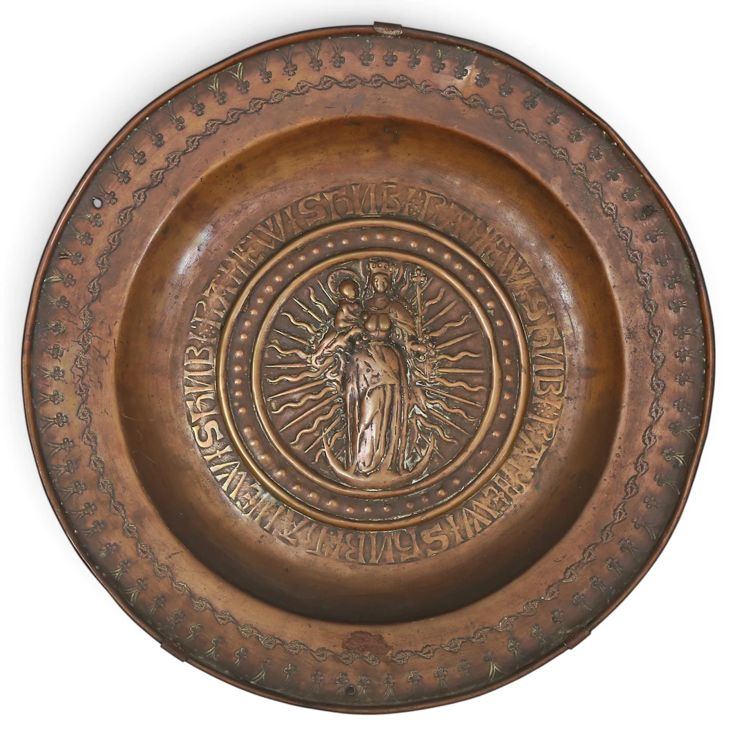 Dinard or Nuremberg charity dish in embossed brass, depicting Madona