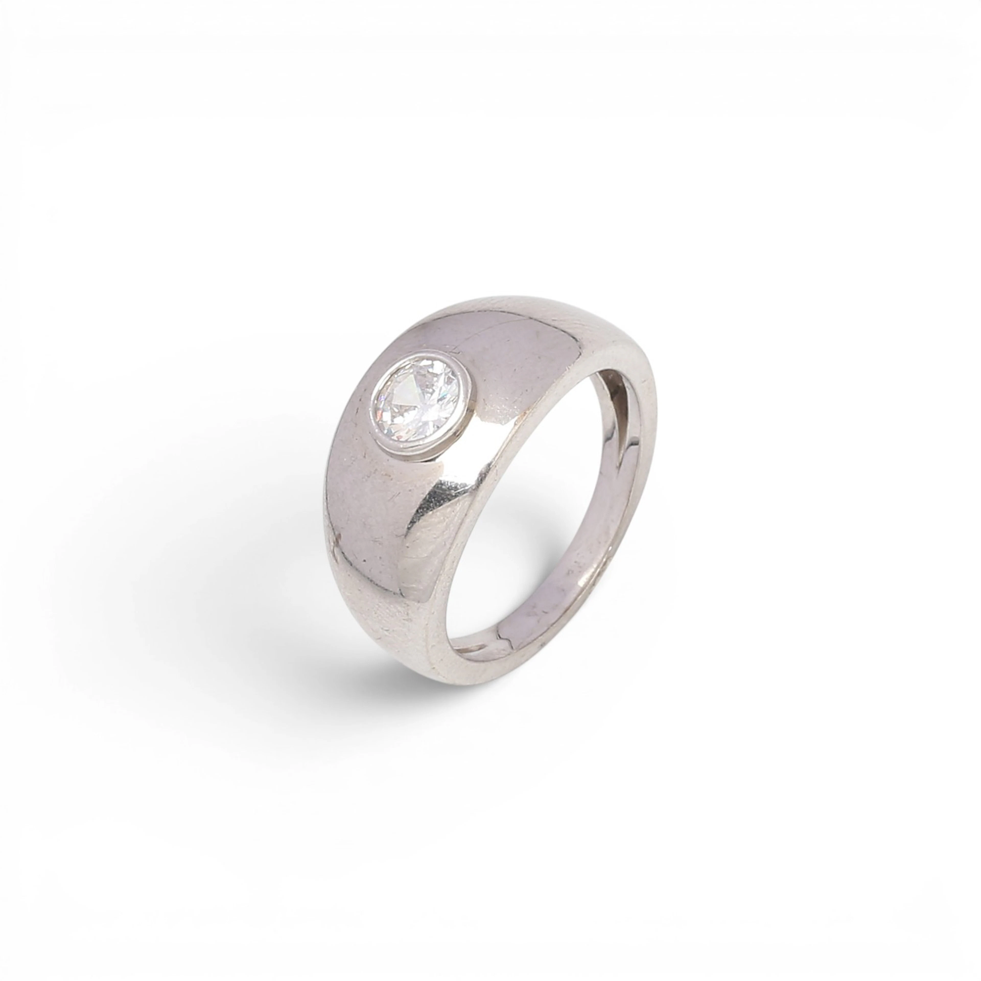 Bombée ring with zircon solitaire.