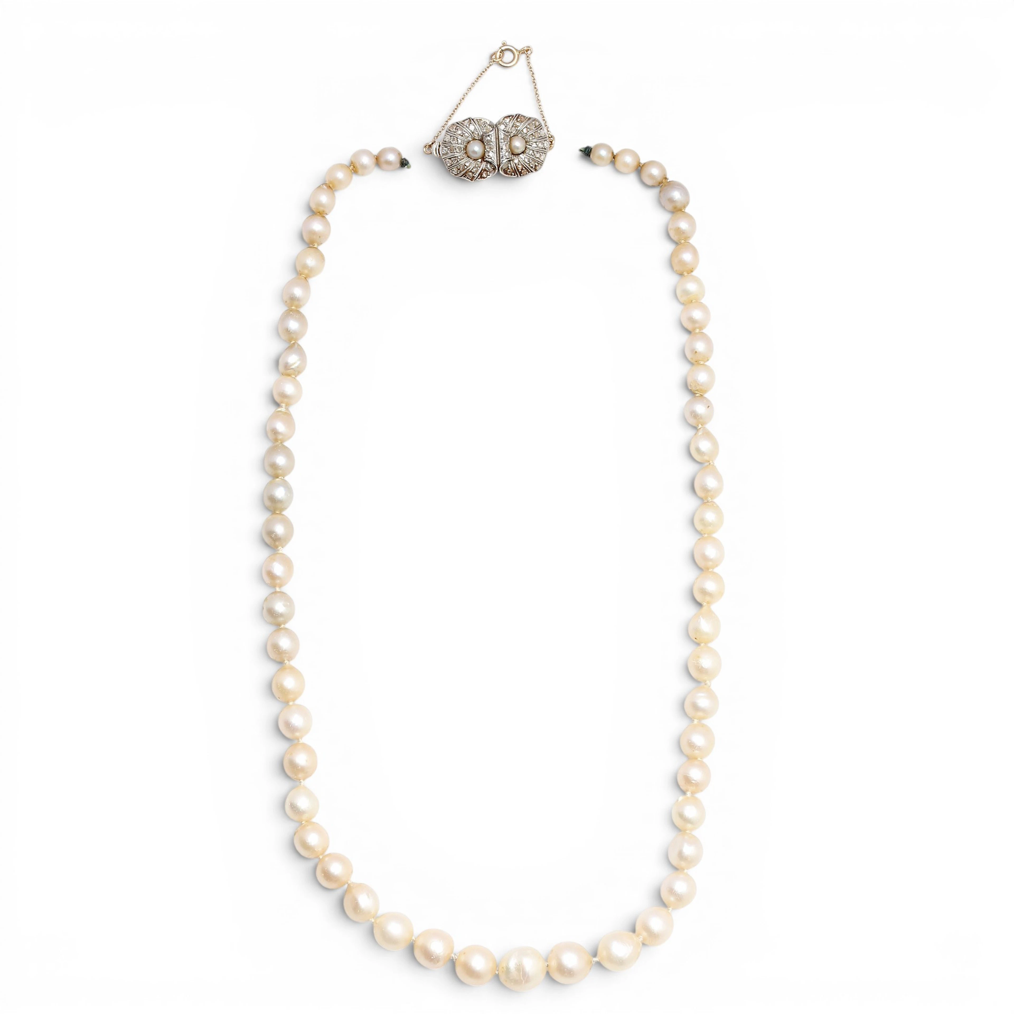Art Deco pearls choker with diamonds shell-style clasp, circa 1930.
