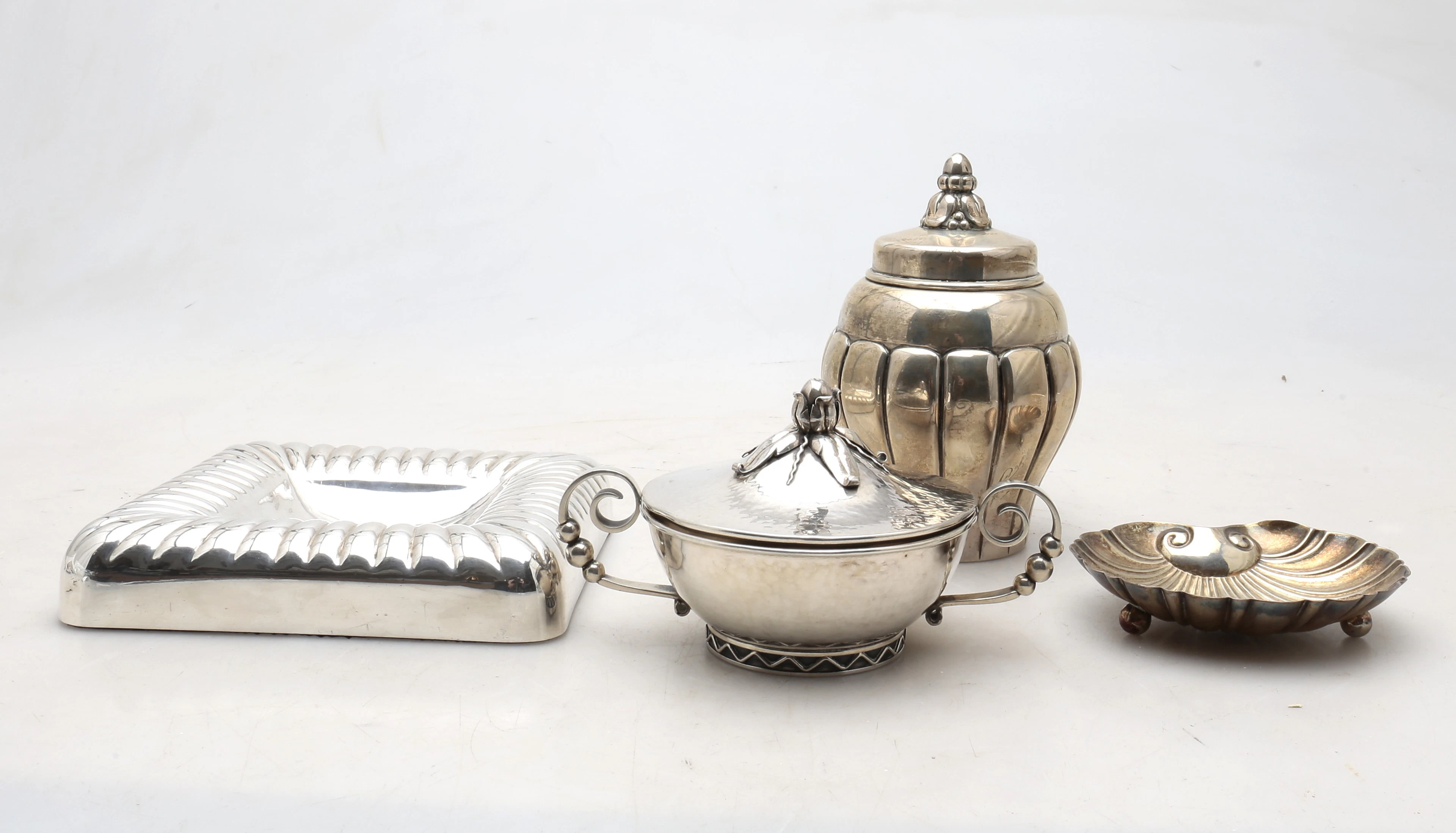 Chocolates jar, pot, shell and ashtray in silver, second third of