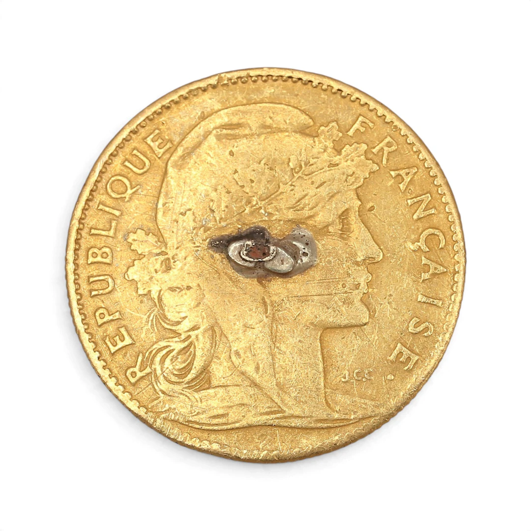 Moneda francesa en oro, de principios del siglo XX.