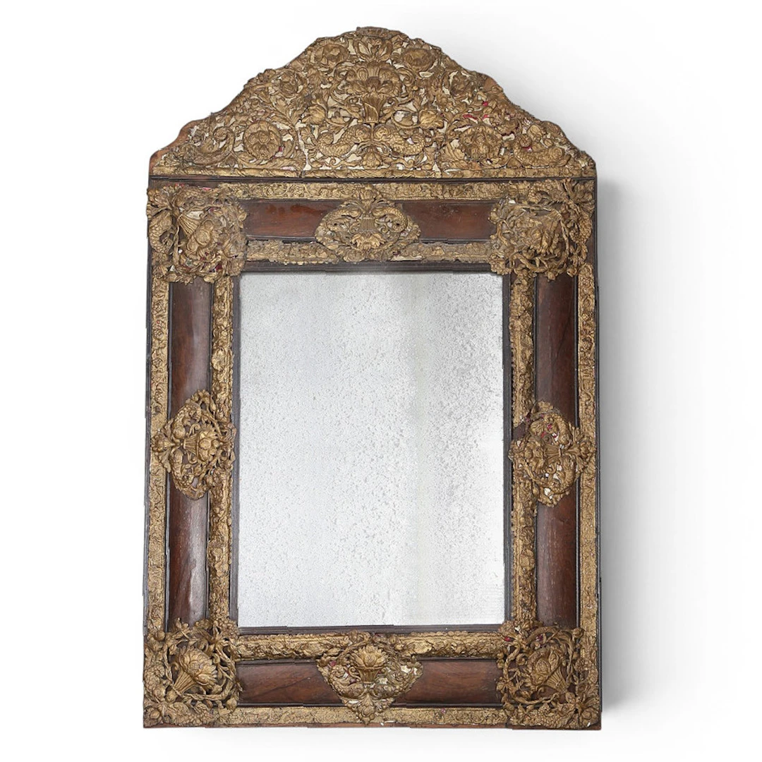 Dutch Baroque mirror in embossed brass and walnut, 18th Century.