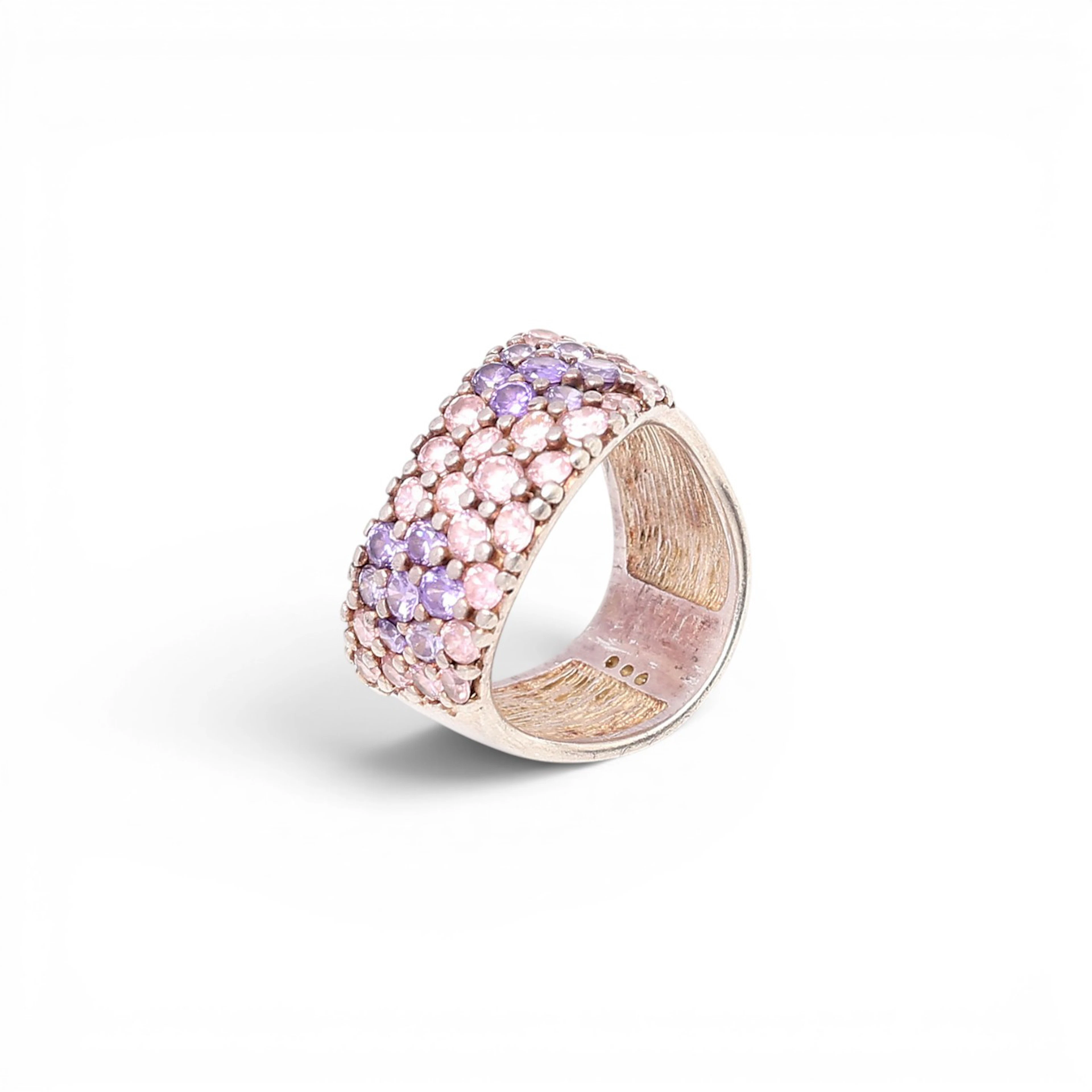 Wide ring with zircons pavé.