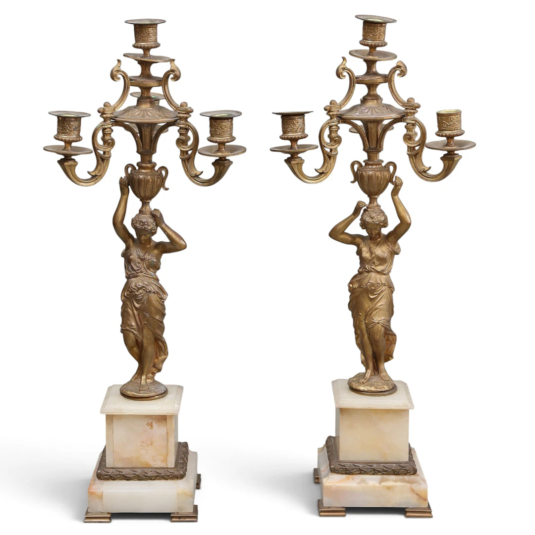 Pair of Napoleon III candelabra in gilt bronze and onyx, late 19th Century.