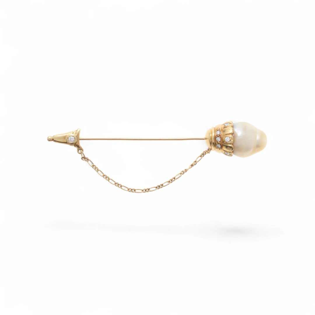Broche - aguja de diamantes y perla barroca.
