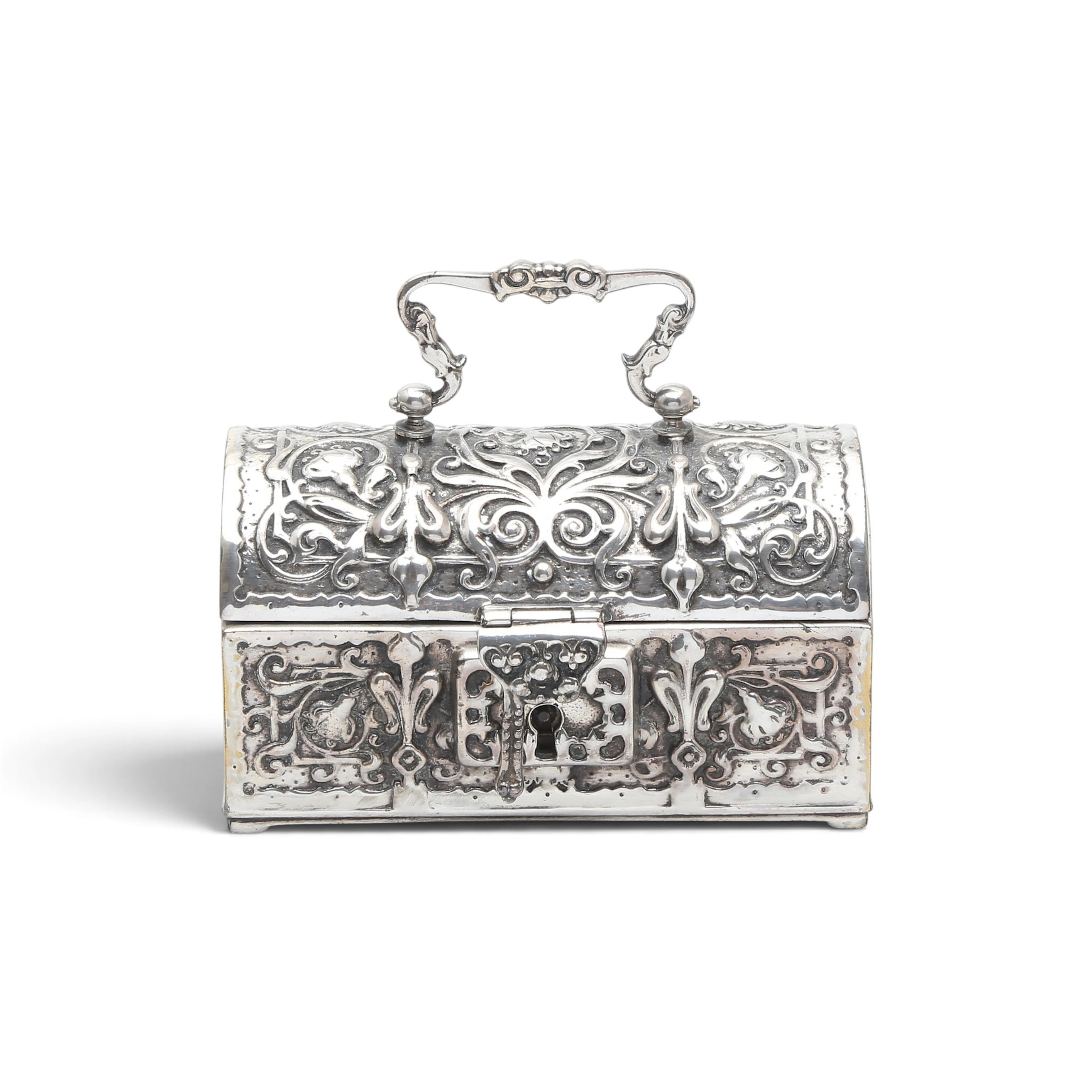 Historicist chest in silvery metal, early decades of the 20th Century.