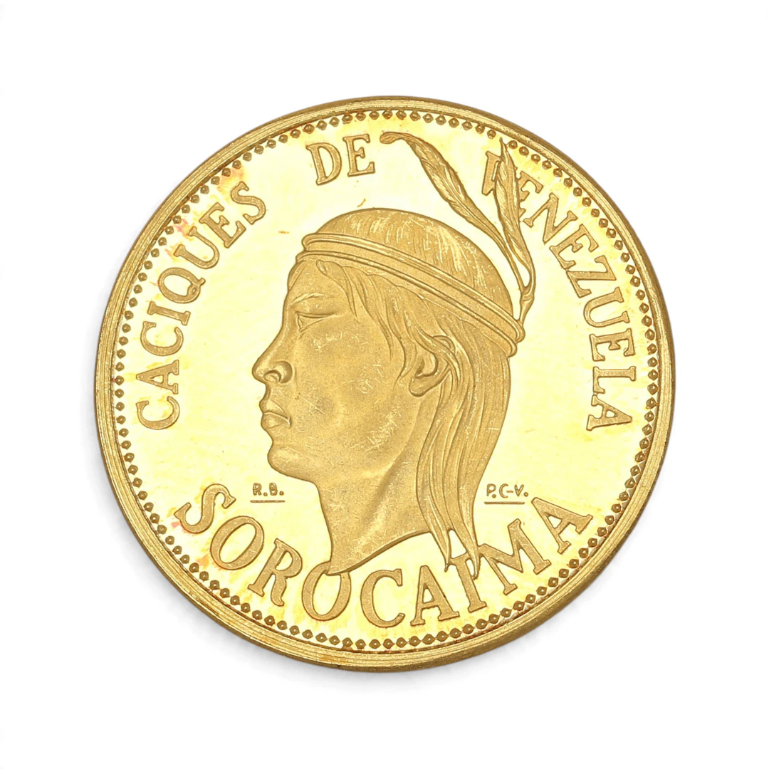 Moneda venezolana en oro.